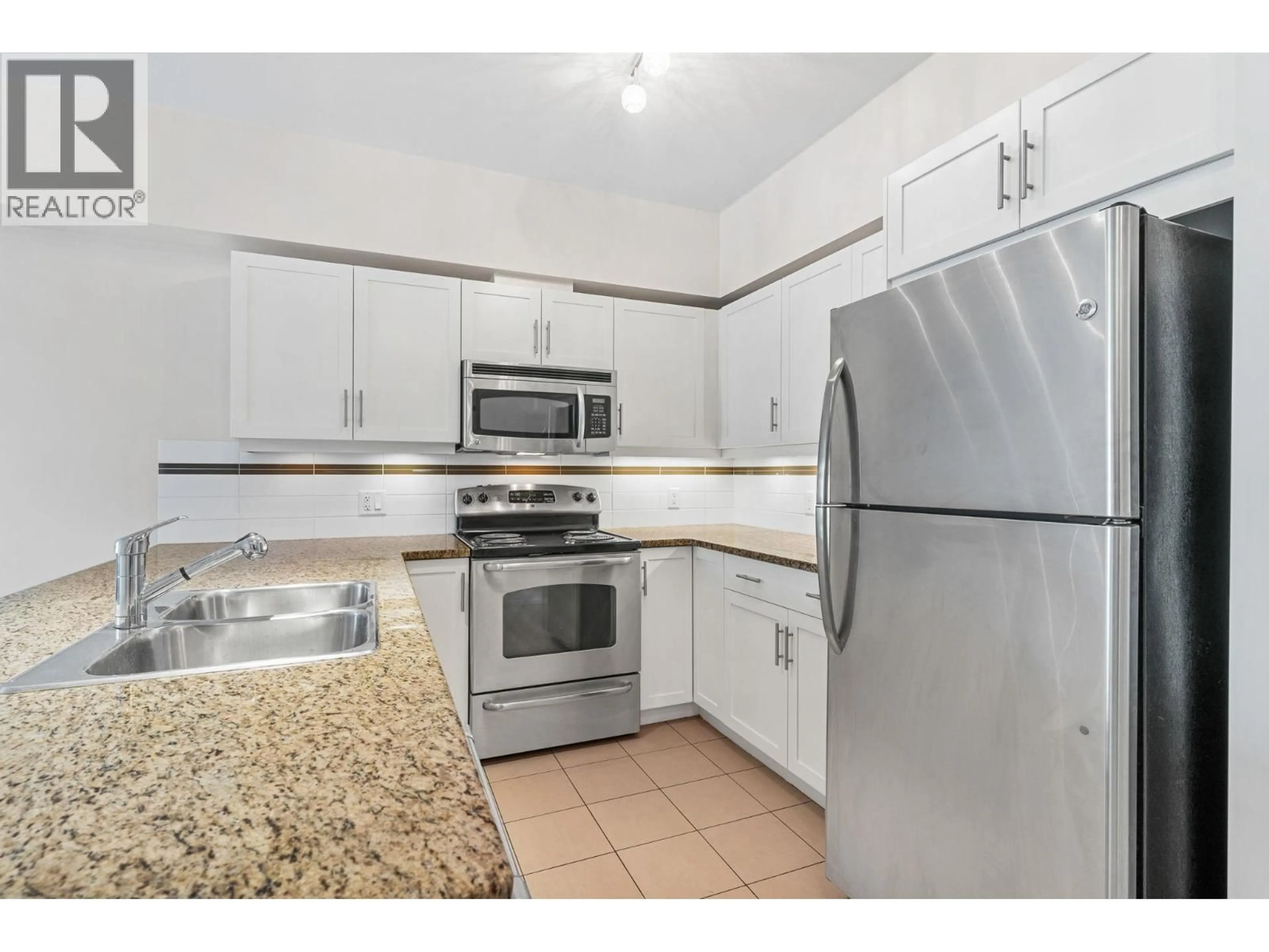 Standard kitchen, unknown for 202 - 1350 RIDGEWAY DRIVE, Kelowna British Columbia V1Y9T8