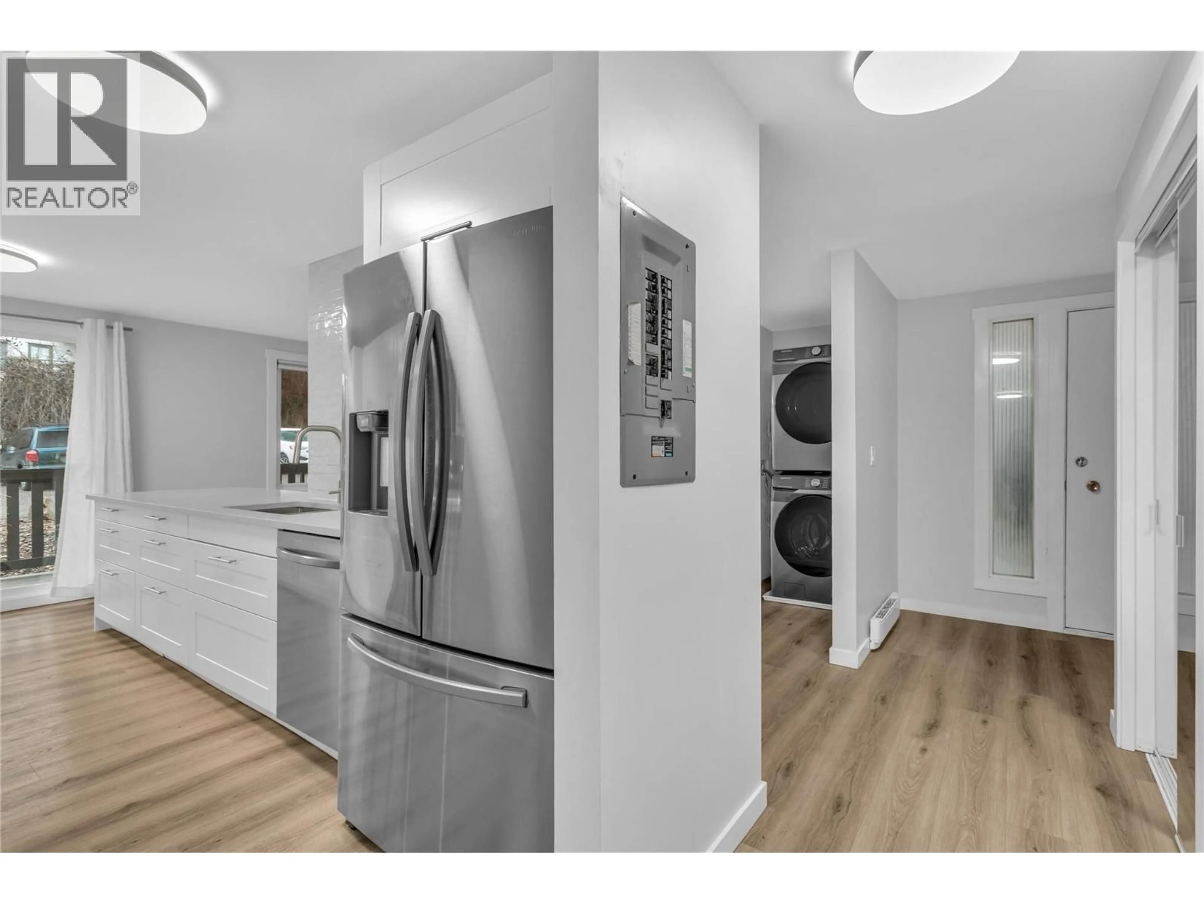 Kitchen with laundary machines, unknown for 132 - 3505 38 STREET, Vernon British Columbia V1T6X1