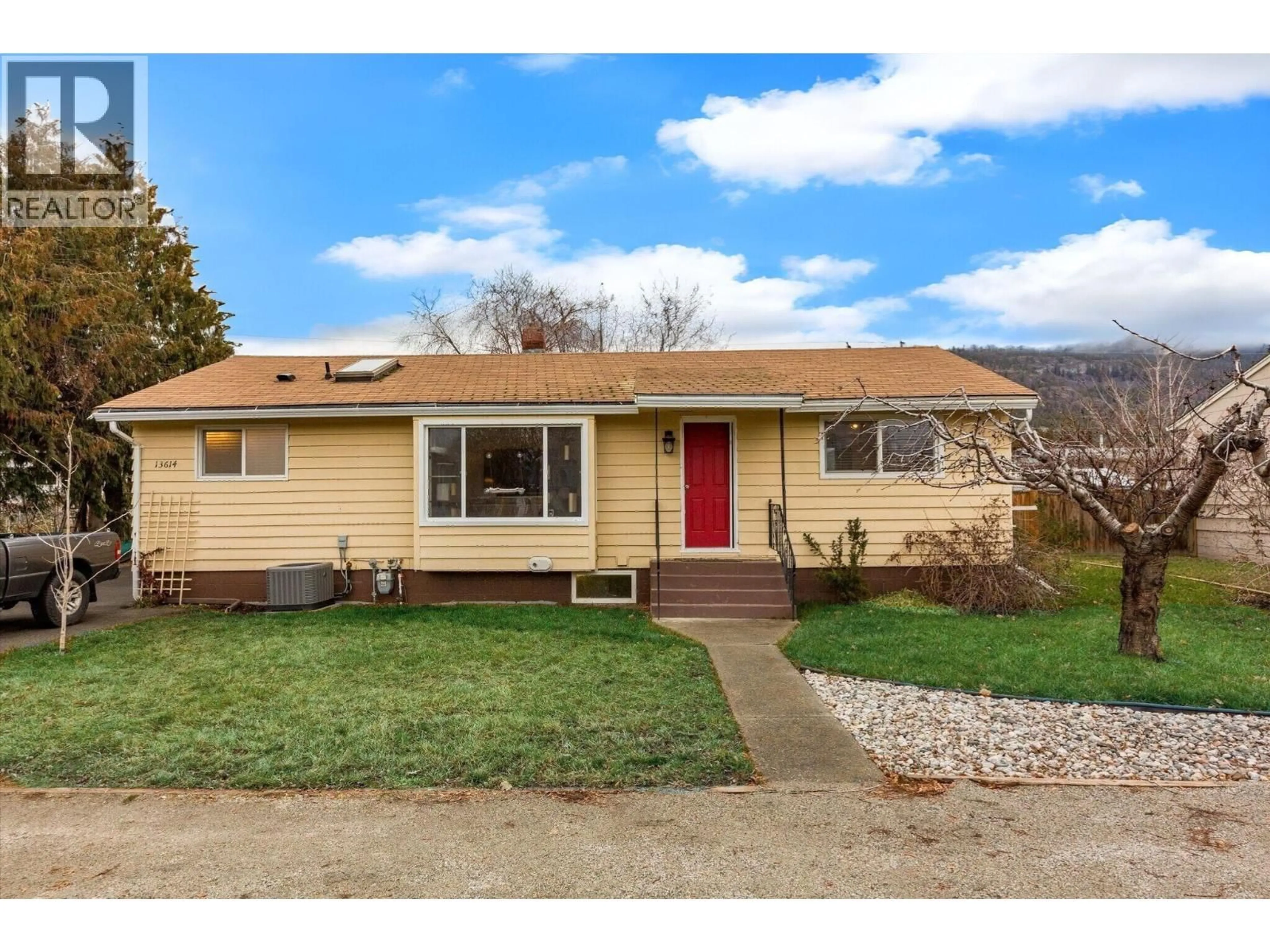 Home with vinyl exterior material, street for 13614 SPENCER AVENUE, Summerland British Columbia V0H1Z0