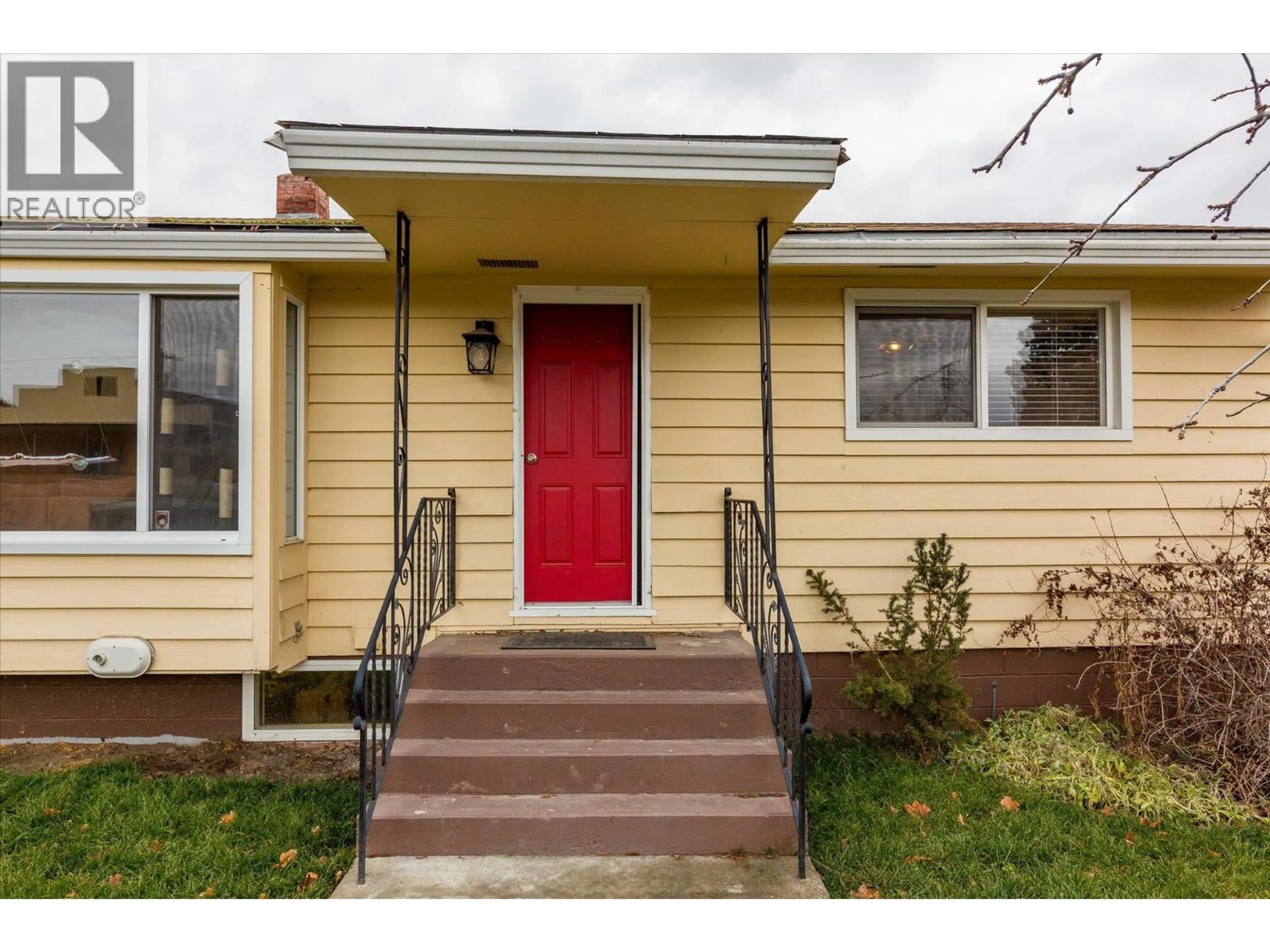 Home with vinyl exterior material, street for 13614 SPENCER AVENUE, Summerland British Columbia V0H1Z0