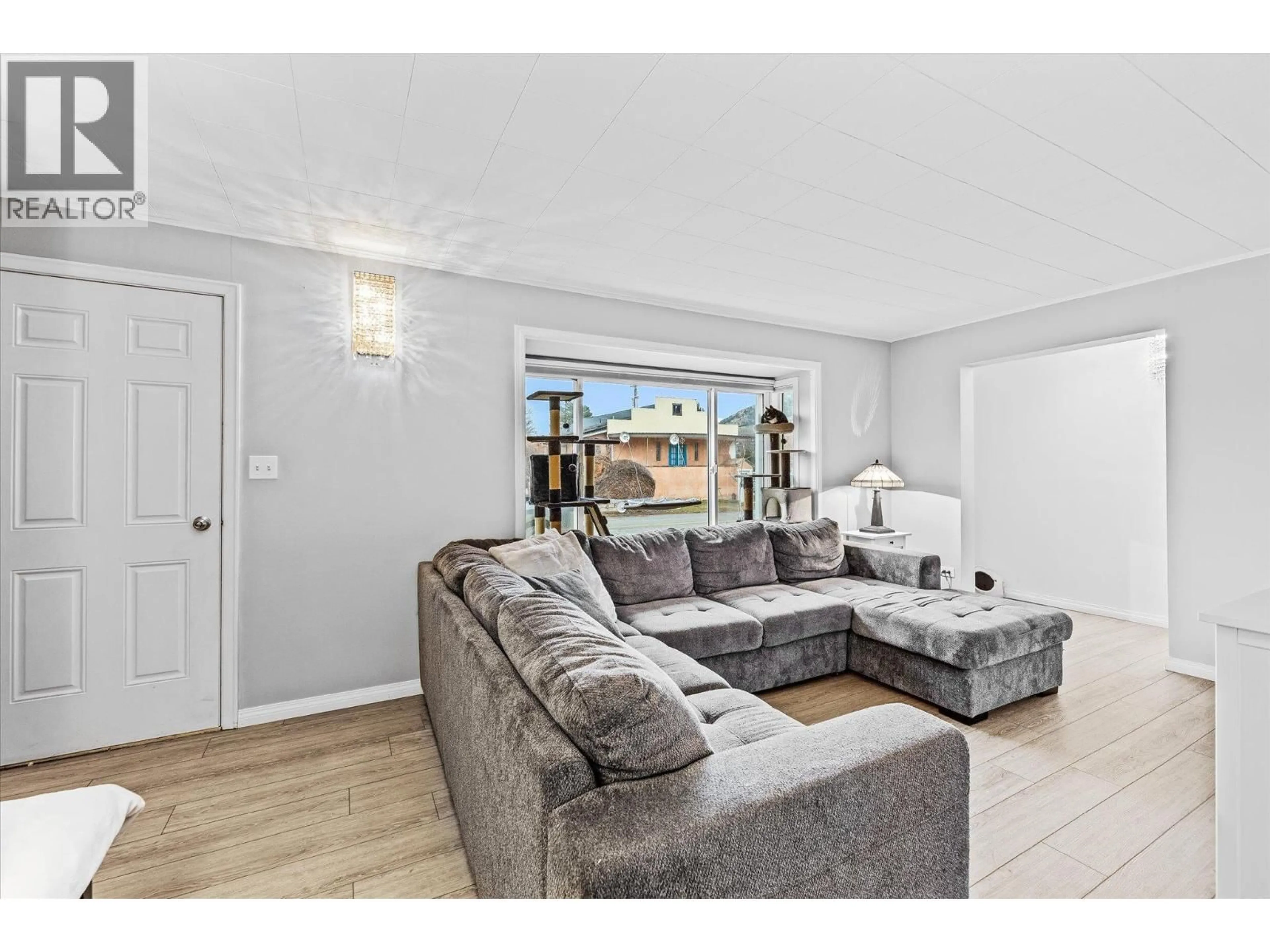 Living room with furniture, unknown for 13614 SPENCER AVENUE, Summerland British Columbia V0H1Z0