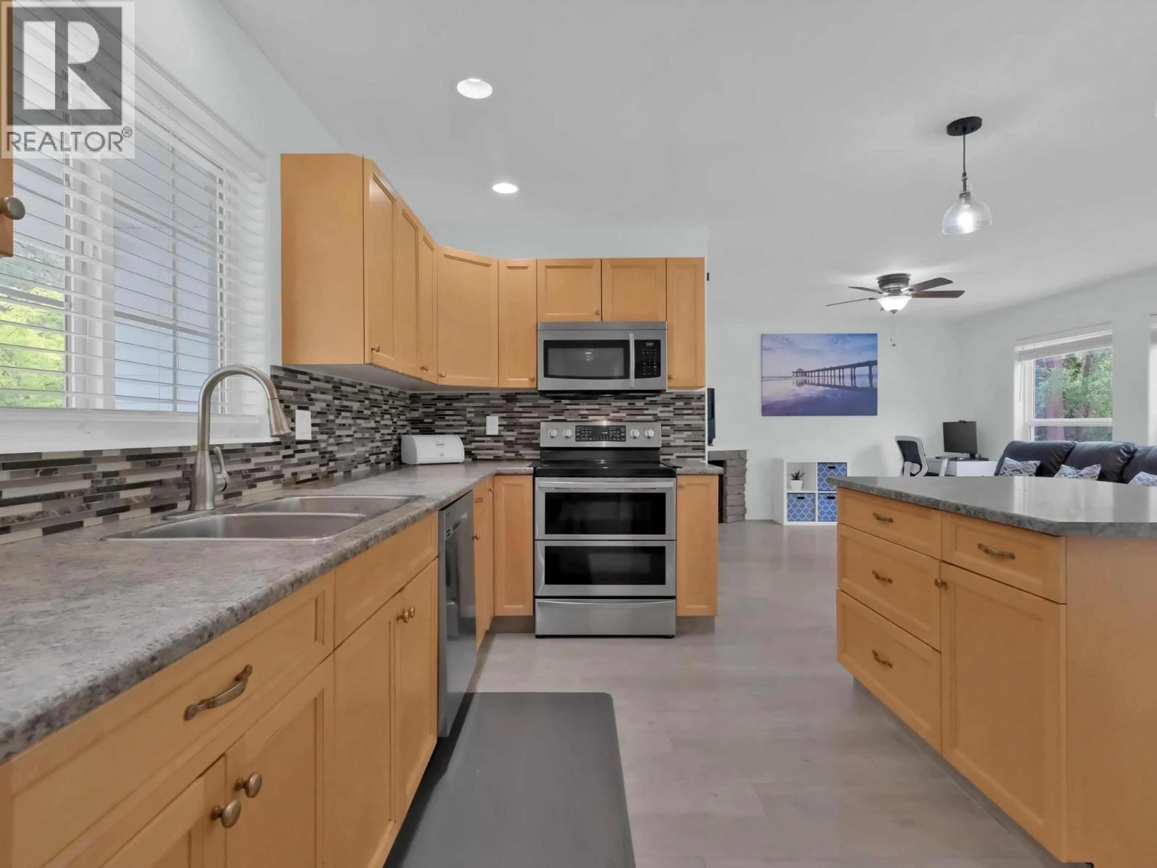 Contemporary kitchen, ceramic/tile floor for 7200 VICTORIA ROAD SOUTH, Summerland British Columbia V0H1Z2