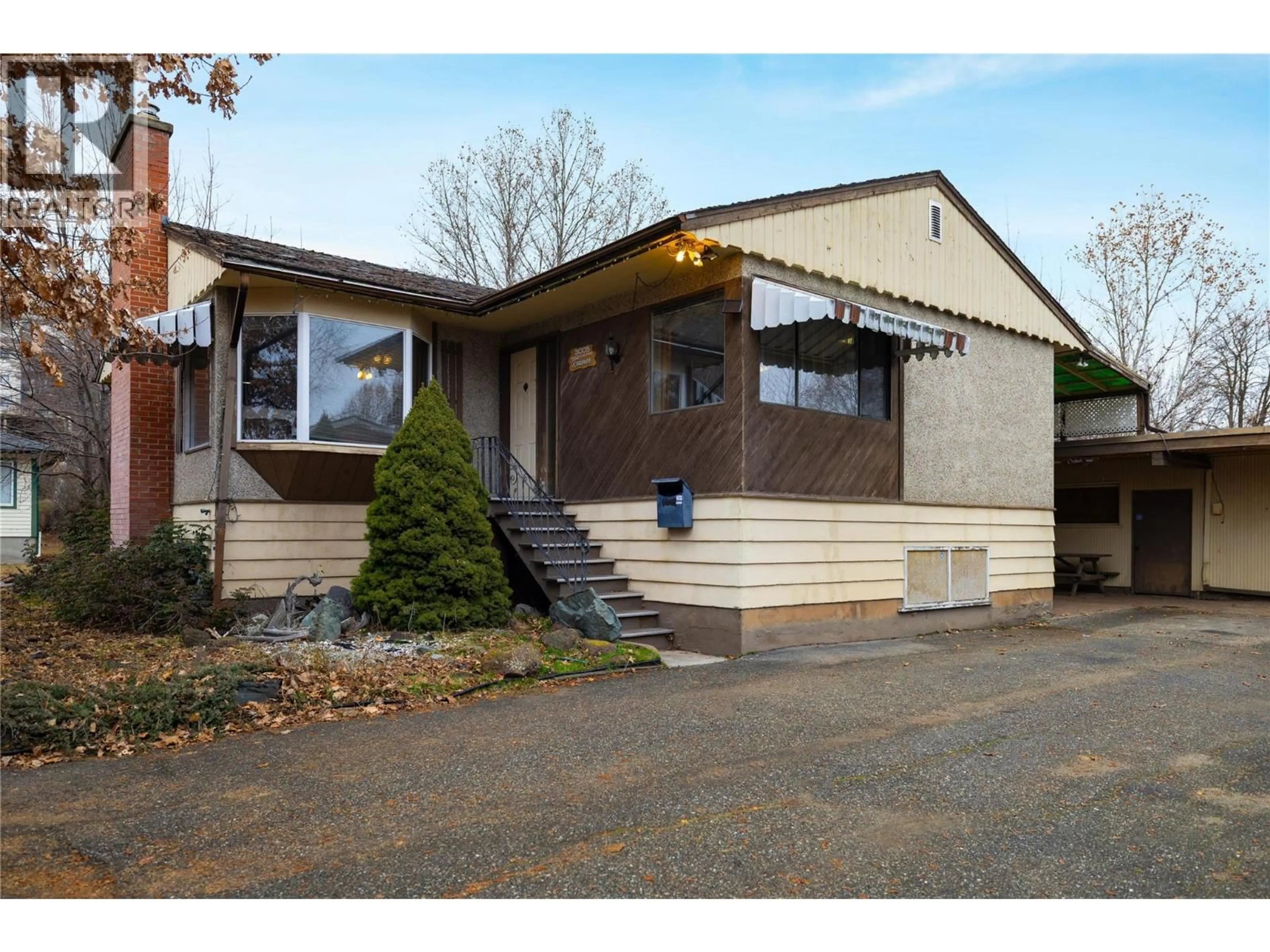 Home with vinyl exterior material, street for 3005 39A STREET, Vernon British Columbia V1T6J5