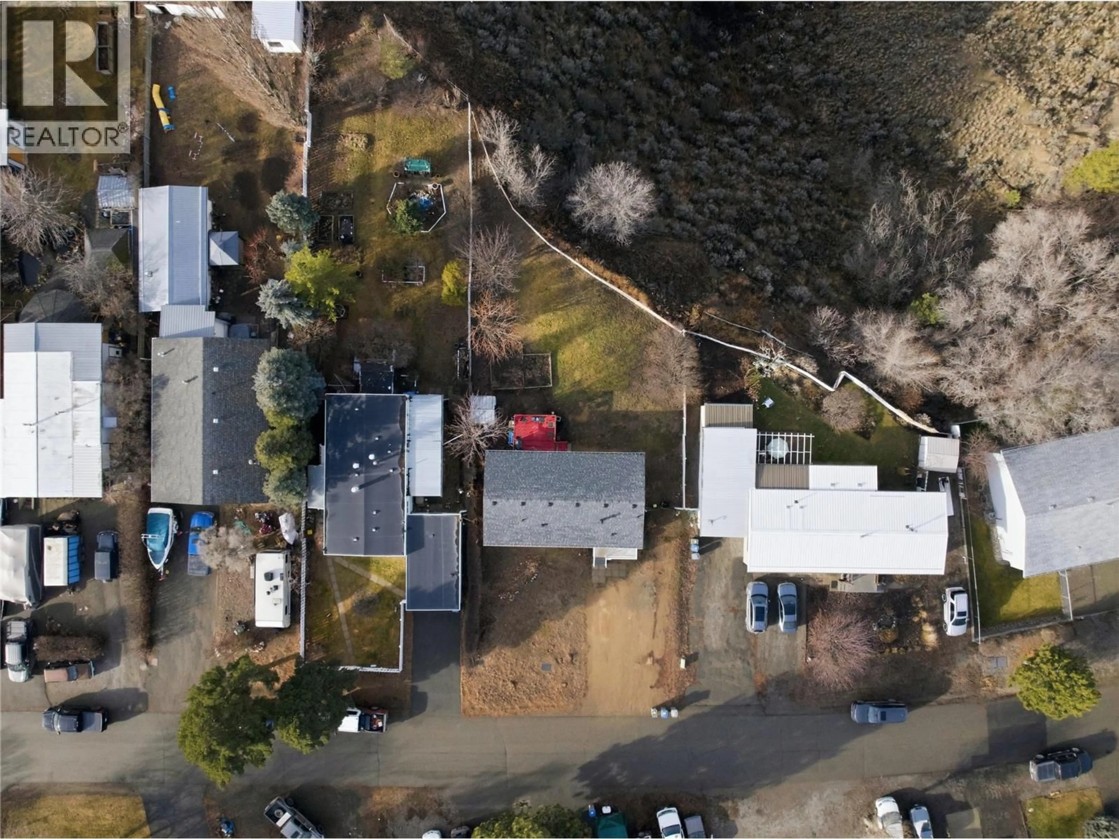 A pic from outside/outdoor area/front of a property/back of a property/a pic from drone, street for 779 KLAHANIE DRIVE, Kamloops British Columbia V2C5R1