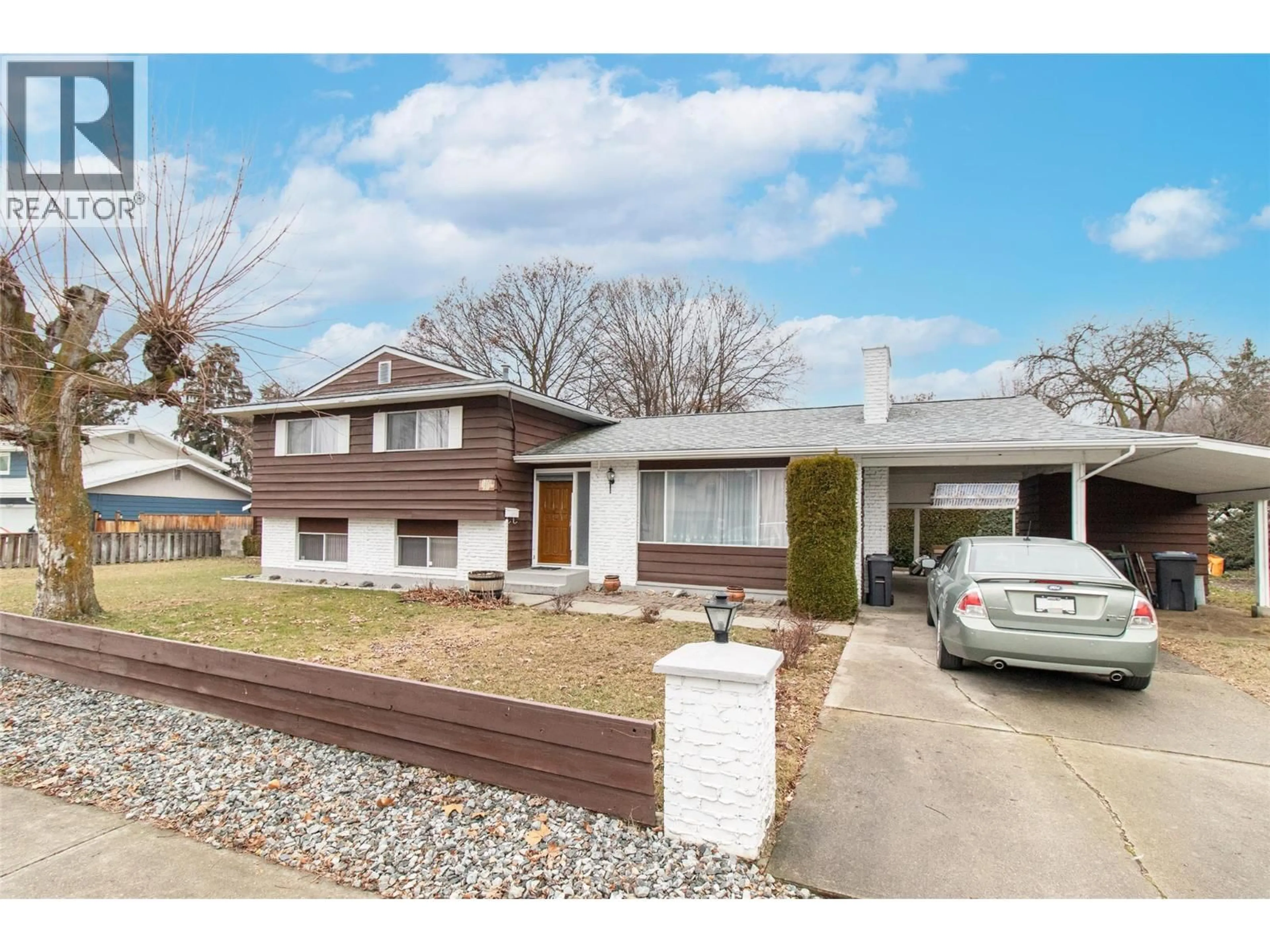 Home with brick exterior material, street for 1590 BLONDEAUX CRESCENT, Kelowna British Columbia V1Y4J6