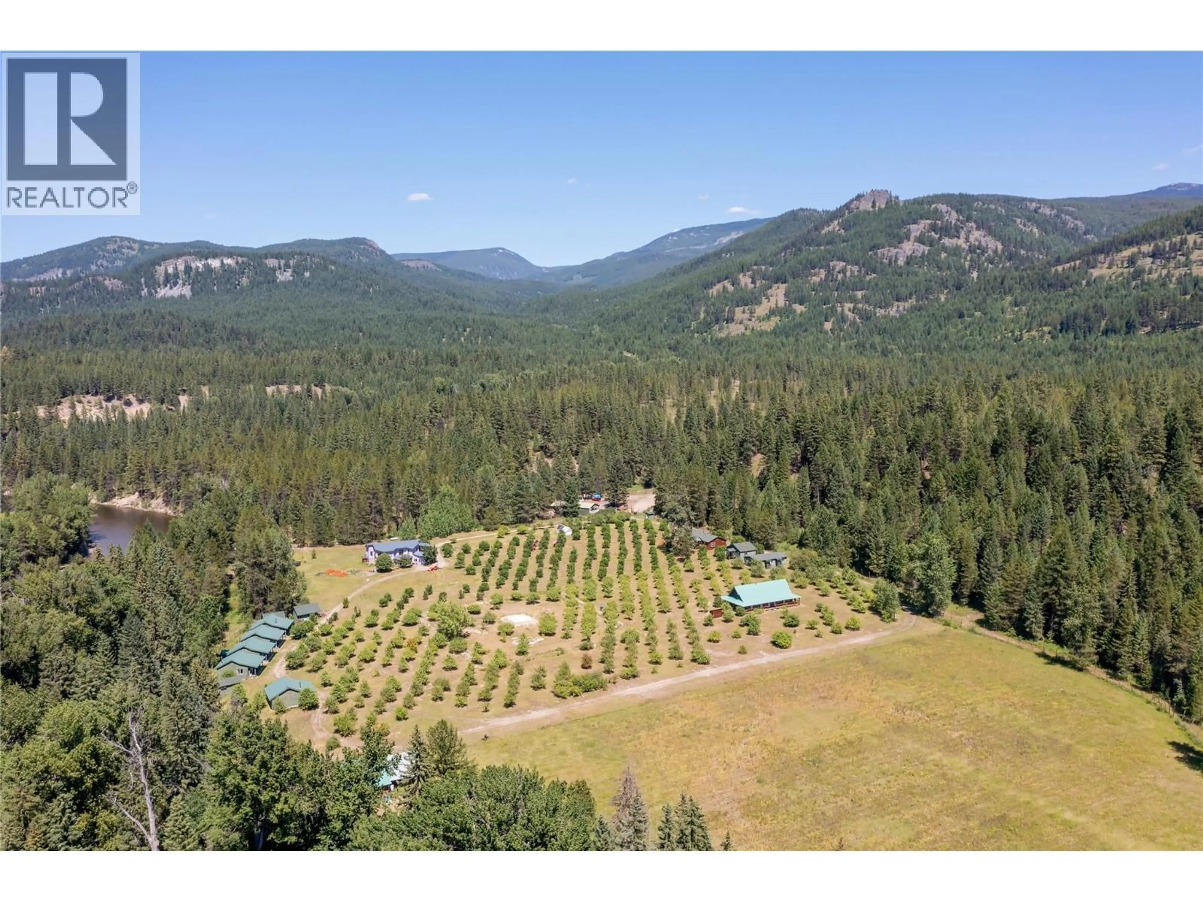 A pic from outside/outdoor area/front of a property/back of a property/a pic from drone, forest/trees view for 6055 KETTLE RIVER FORESTRY SERVICE ROAD, Westbridge British Columbia V0H1Y0