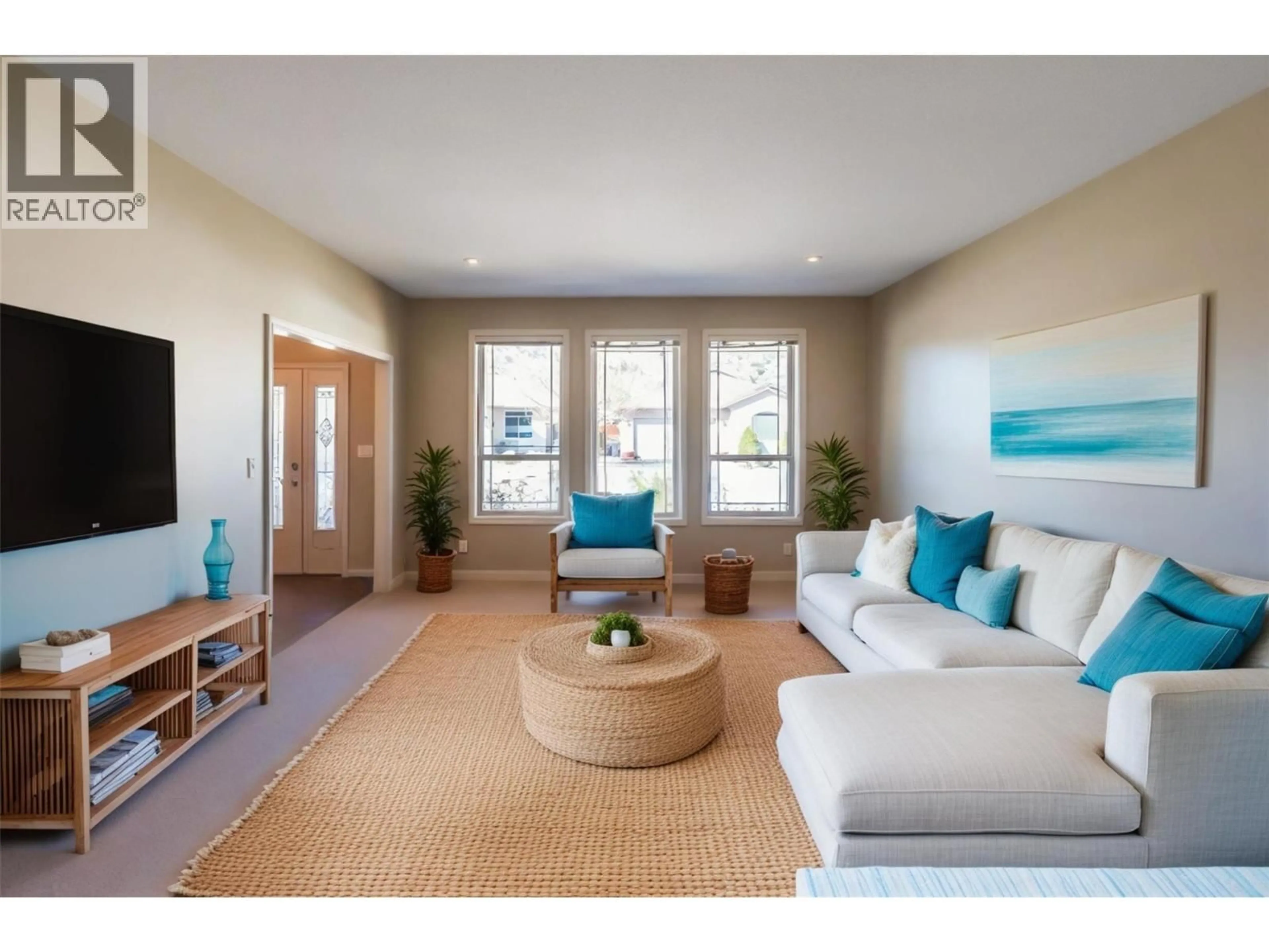 Living room with furniture, wood/laminate floor for 6679 OXBOW CRESCENT, Oliver British Columbia V0H1T4