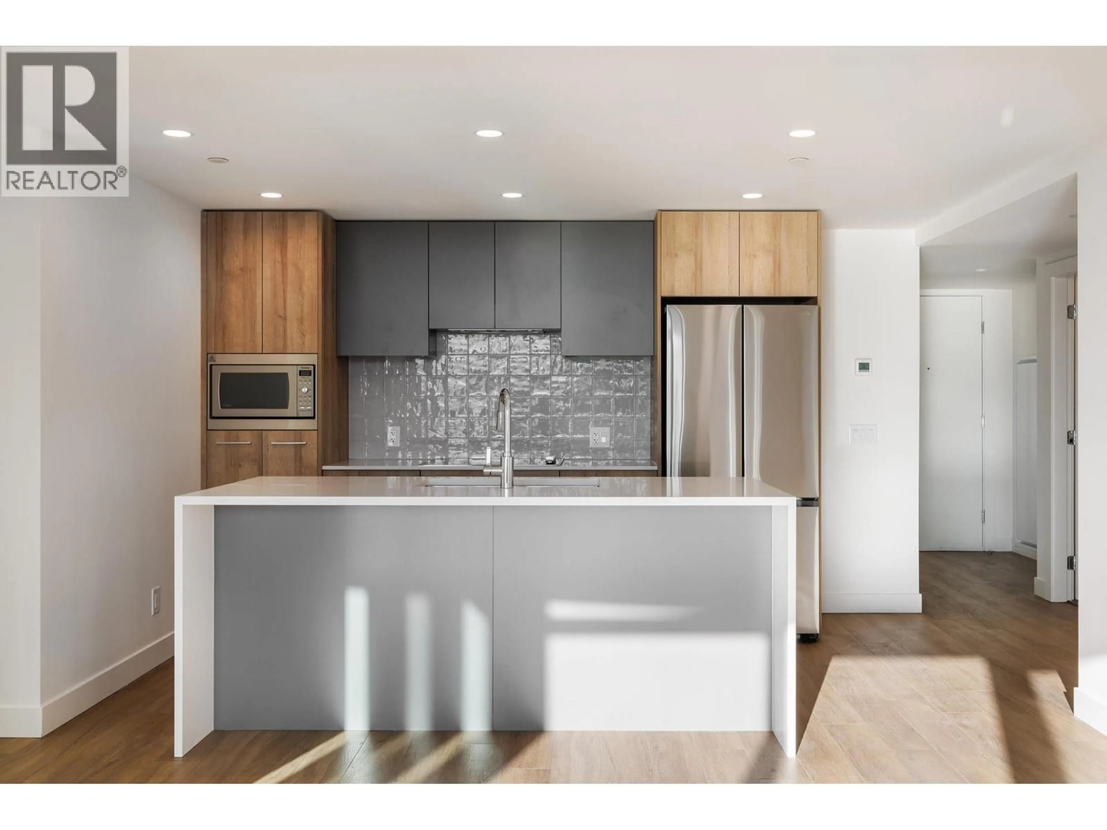 Open concept kitchen, unknown for 909 - 3699 CAPOZZI ROAD, Kelowna British Columbia V1W3L2