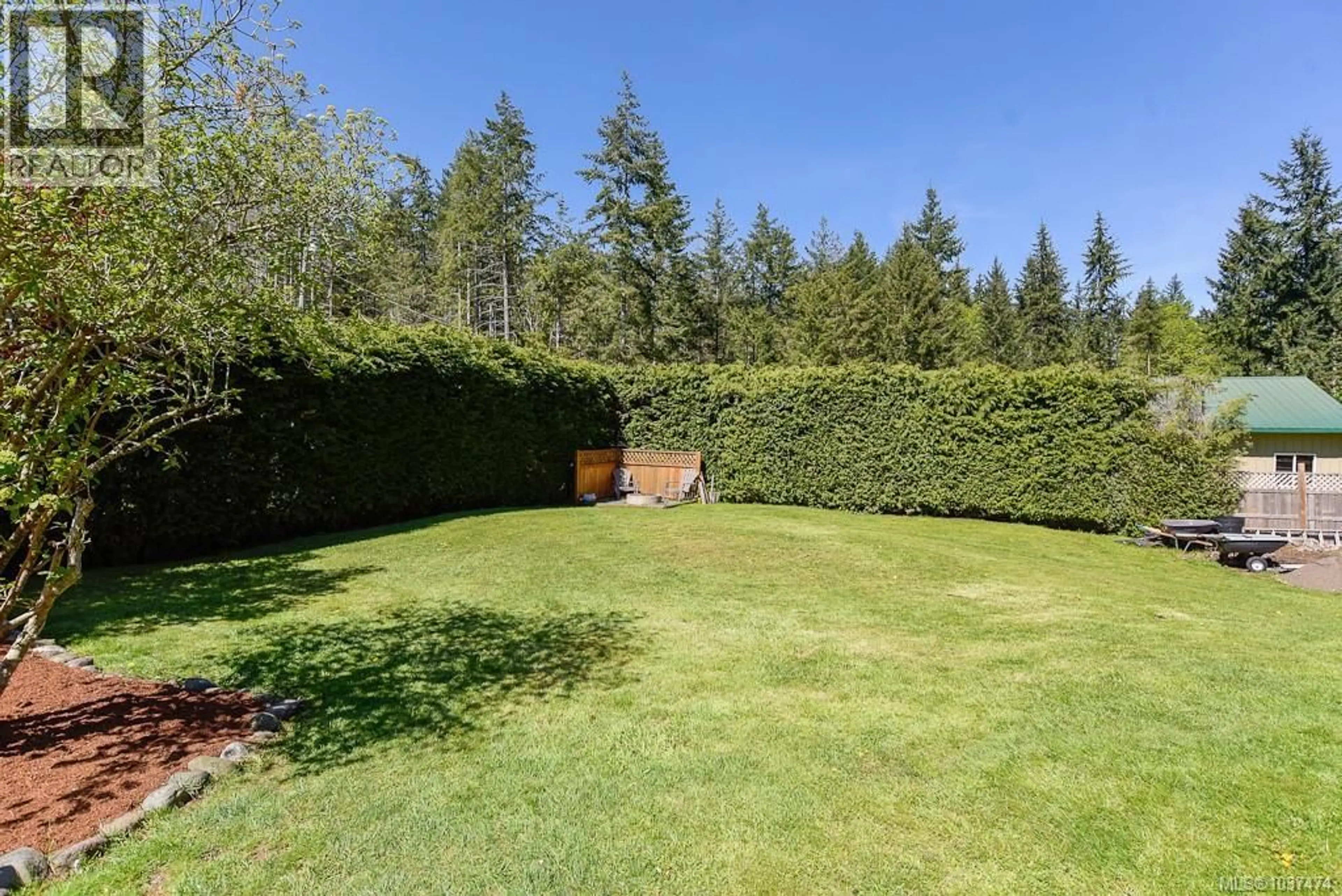 A pic from outside/outdoor area/front of a property/back of a property/a pic from drone, forest/trees view for 1864 BATES ROAD, Courtenay British Columbia V9J1X4
