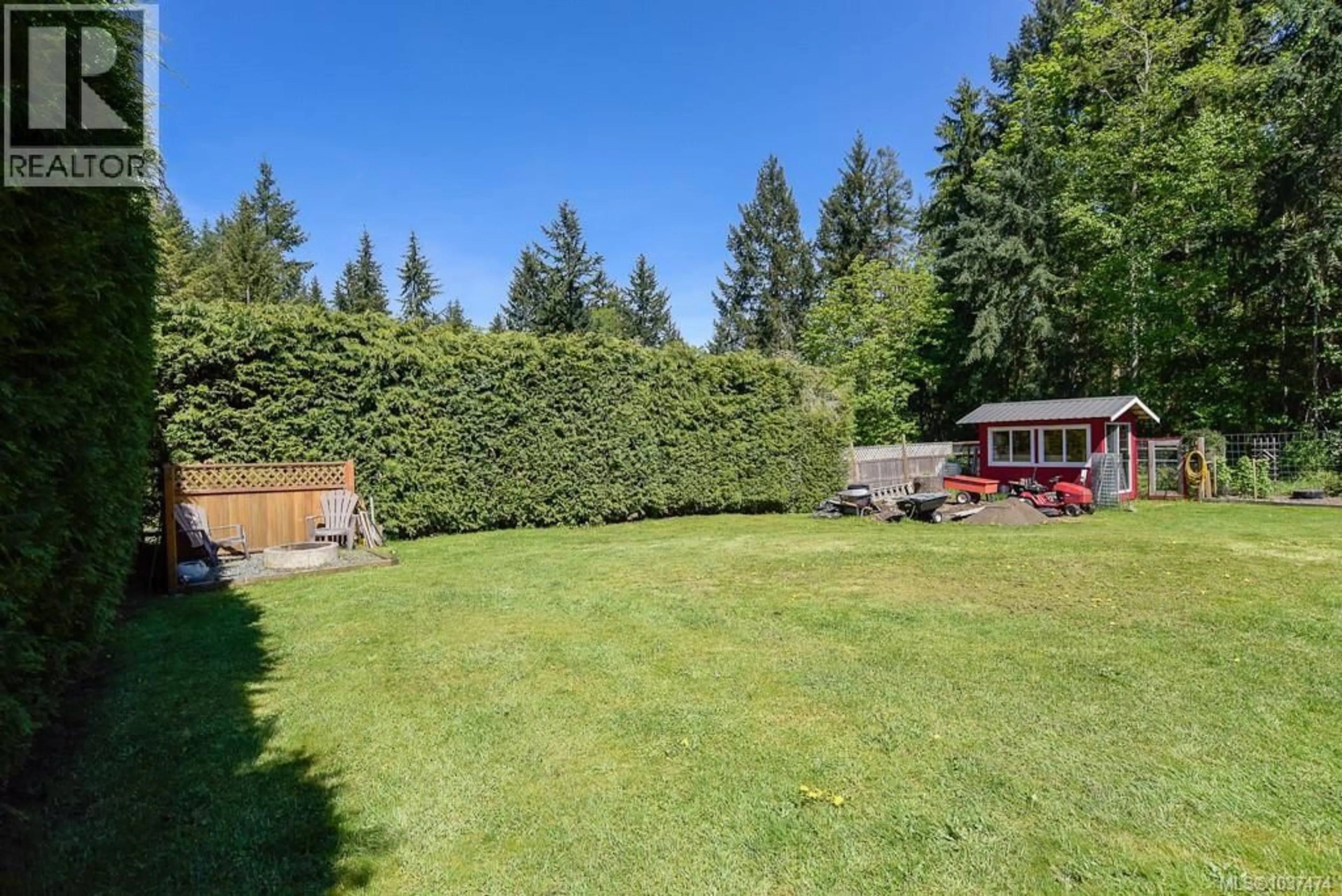 A pic from outside/outdoor area/front of a property/back of a property/a pic from drone, forest/trees view for 1864 BATES ROAD, Courtenay British Columbia V9J1X4