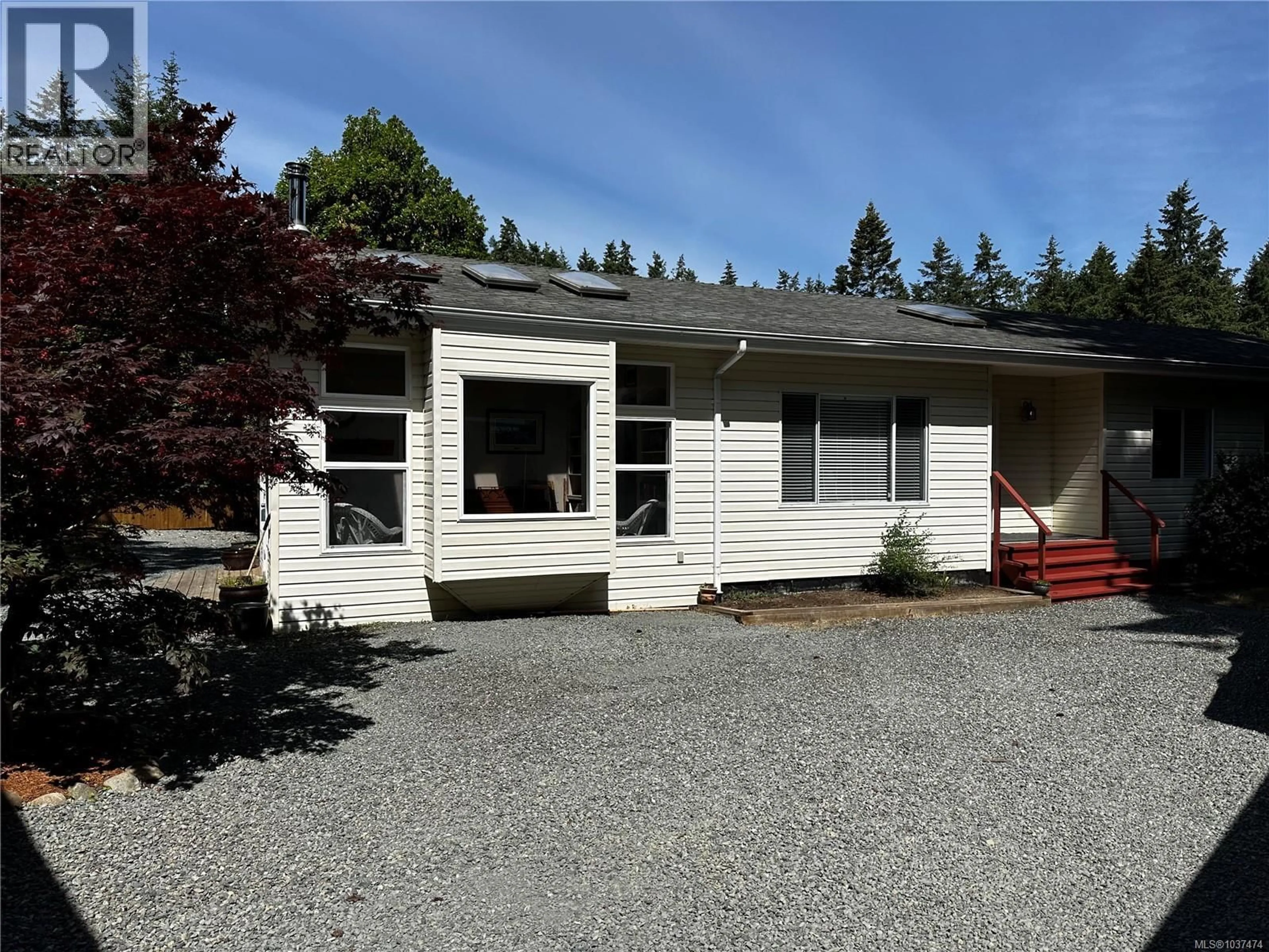 Home with vinyl exterior material, street for 1864 BATES ROAD, Courtenay British Columbia V9J1X4
