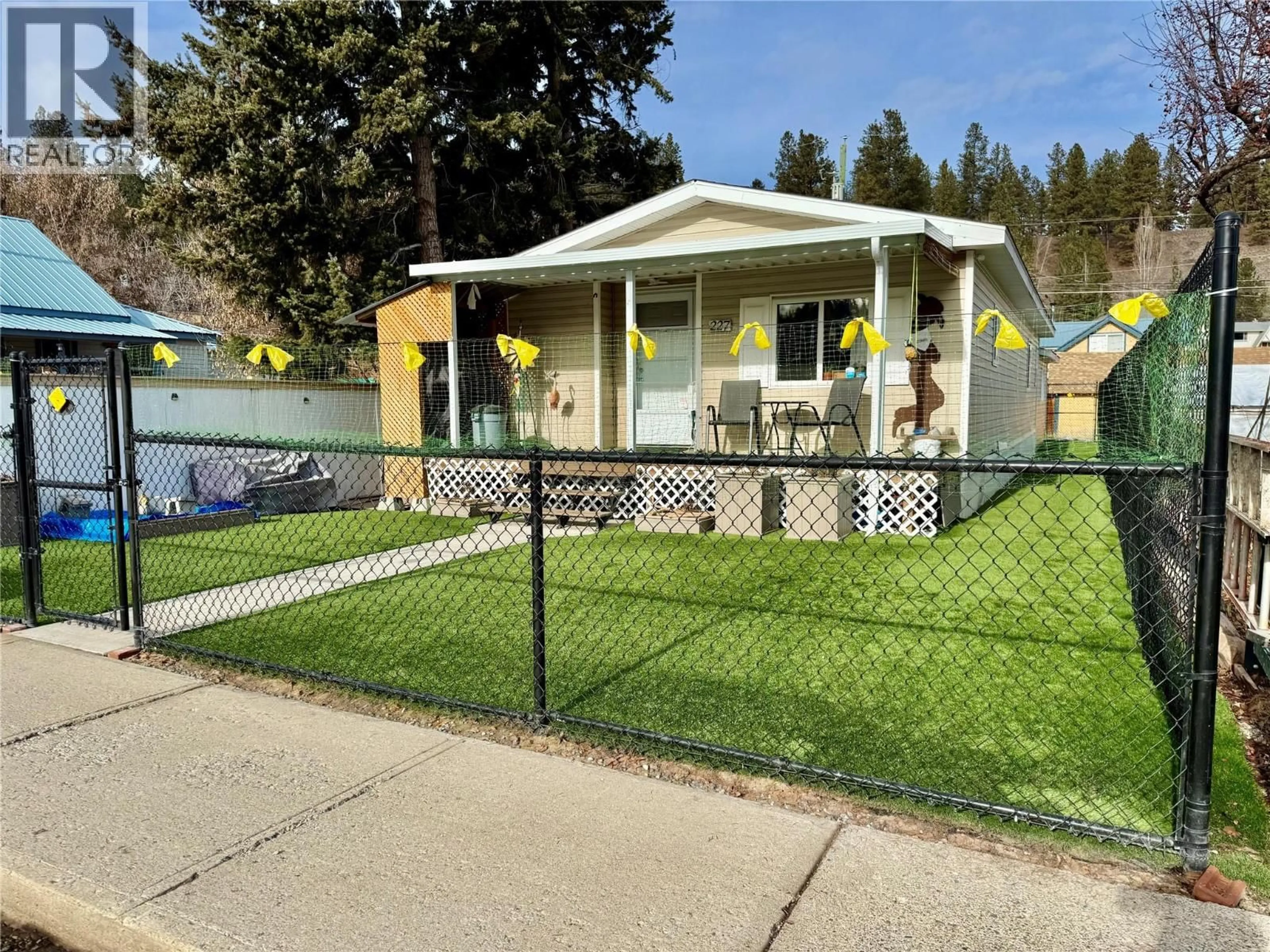 Home with vinyl exterior material, street for 227 ANGELA AVENUE, Princeton British Columbia V0X1W0