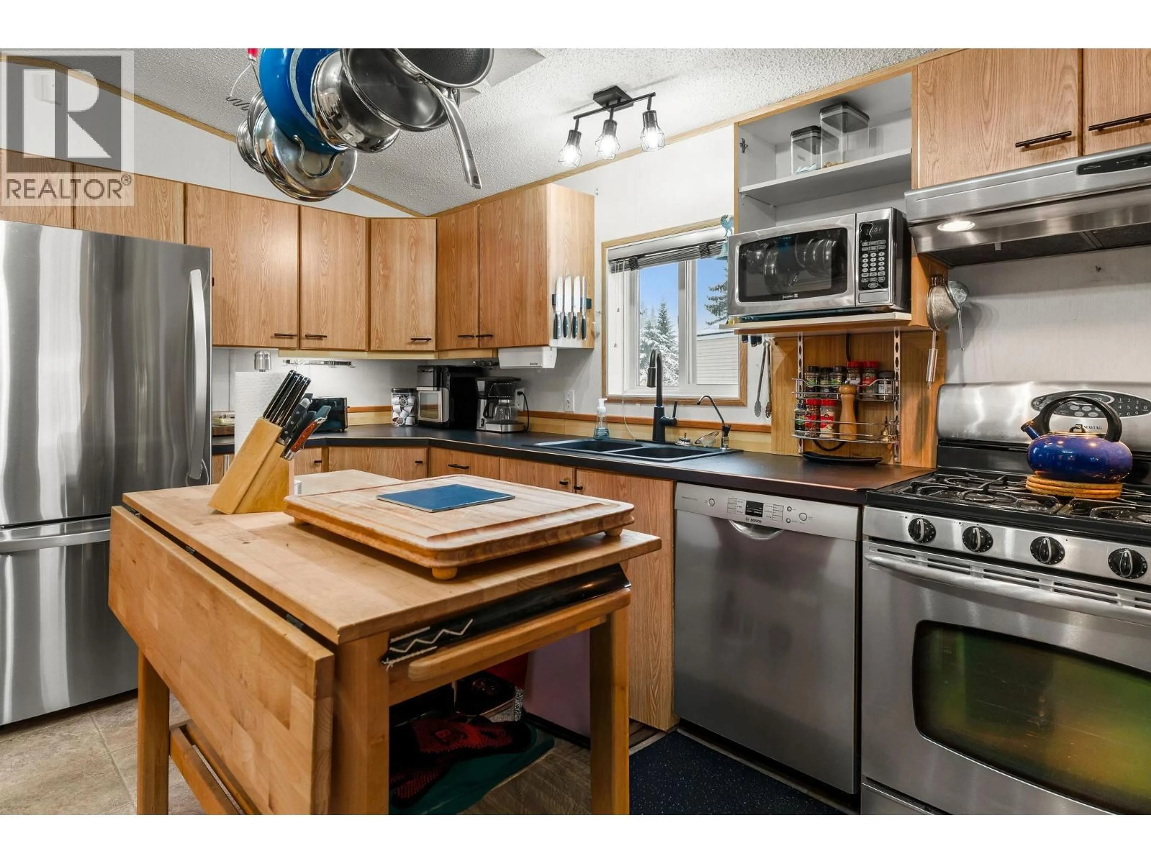 Standard kitchen, wood/laminate floor for 25 - 1200 OSCAR STREET, Revelstoke British Columbia V0E2S0