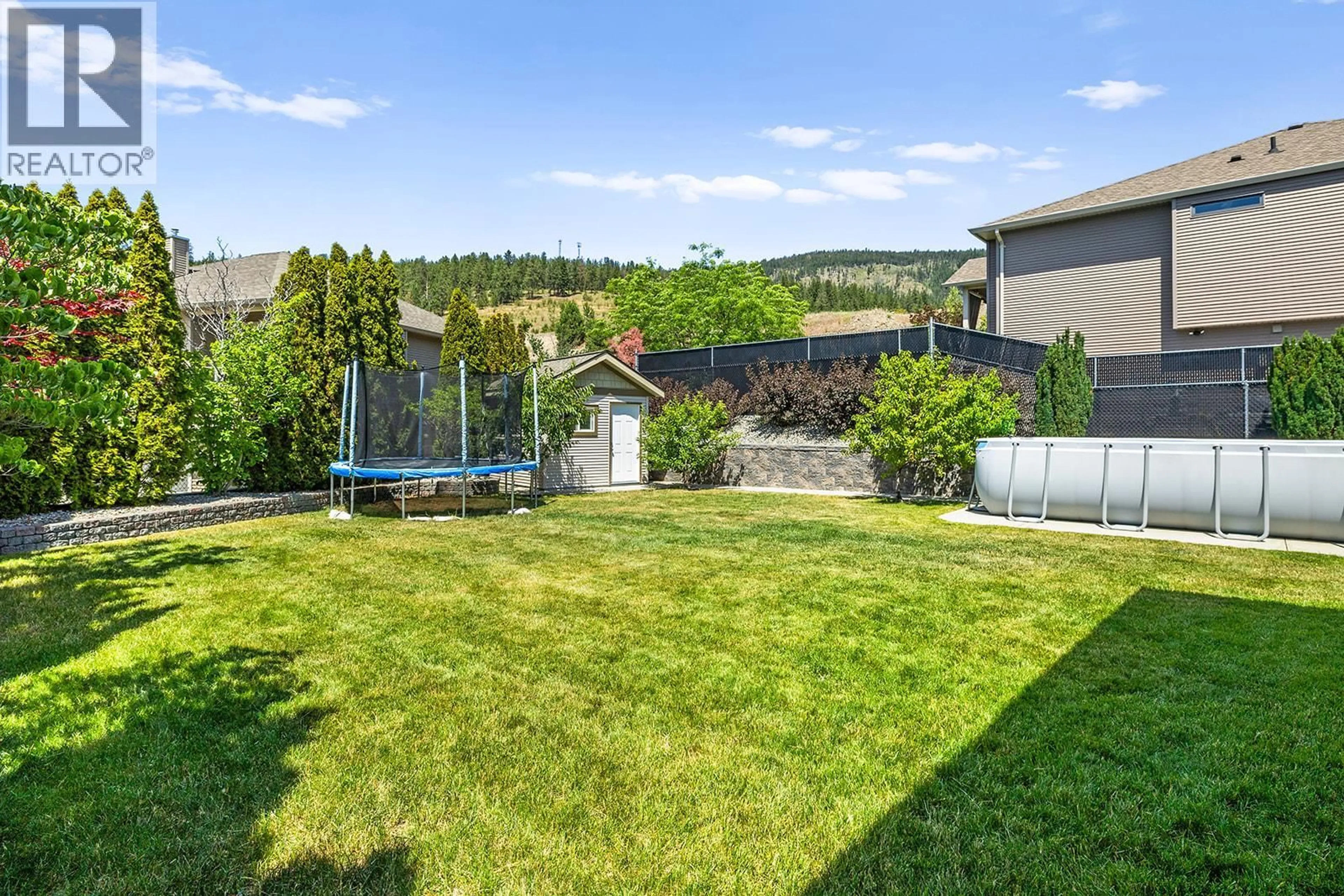 A pic from outside/outdoor area/front of a property/back of a property/a pic from drone, mountain view for 2550 COPPER RIDGE DRIVE, West Kelowna British Columbia V4T2X6