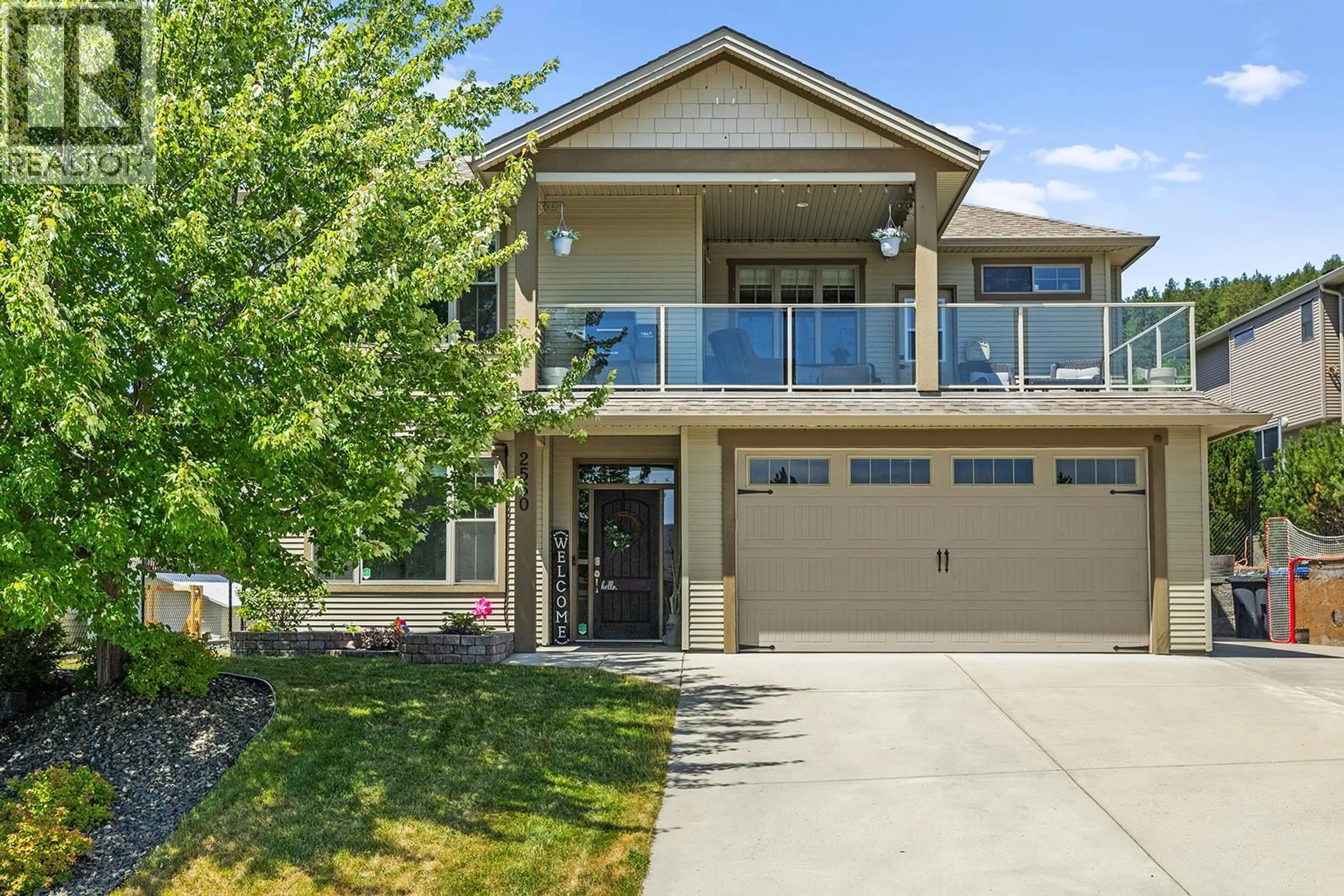 Home with vinyl exterior material, street for 2550 COPPER RIDGE DRIVE, West Kelowna British Columbia V4T2X6
