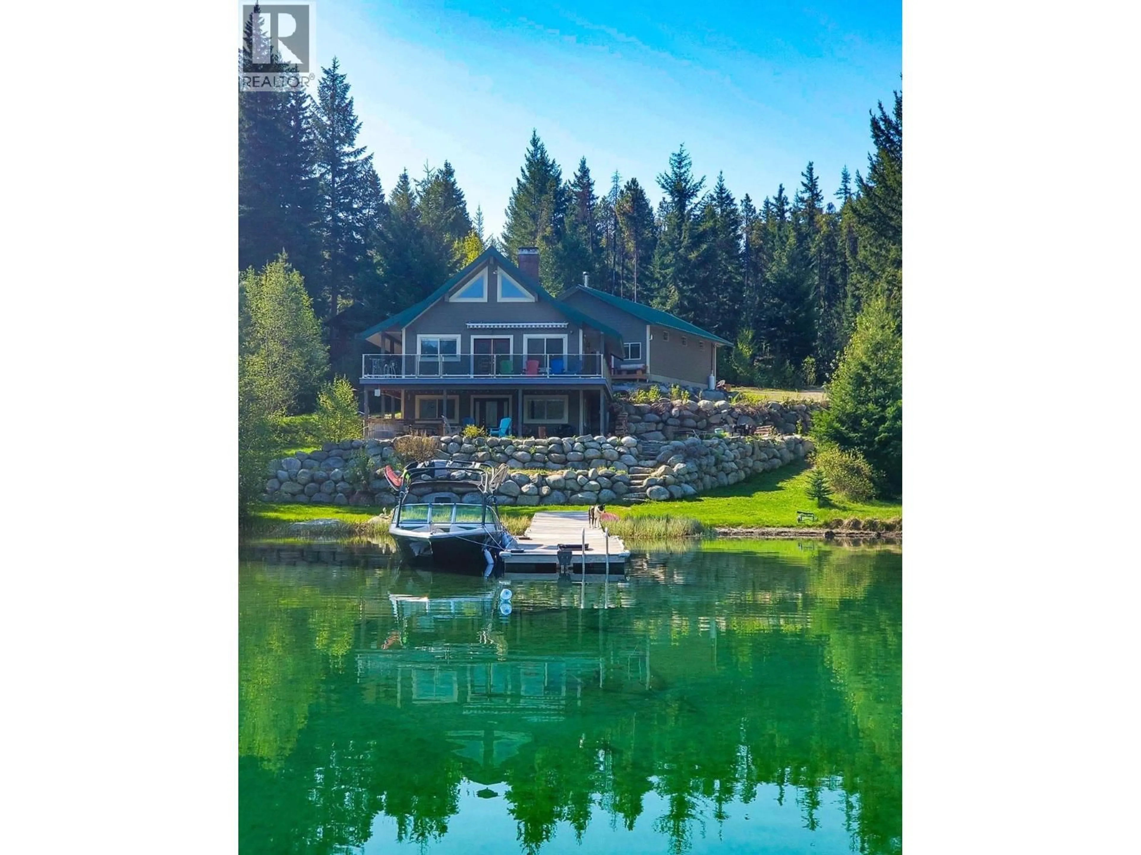 A pic from outside/outdoor area/front of a property/back of a property/a pic from drone, water/lake/river/ocean view for 7068 GUN LAKE WEST ROAD, Gold Bridge British Columbia V0K1P0