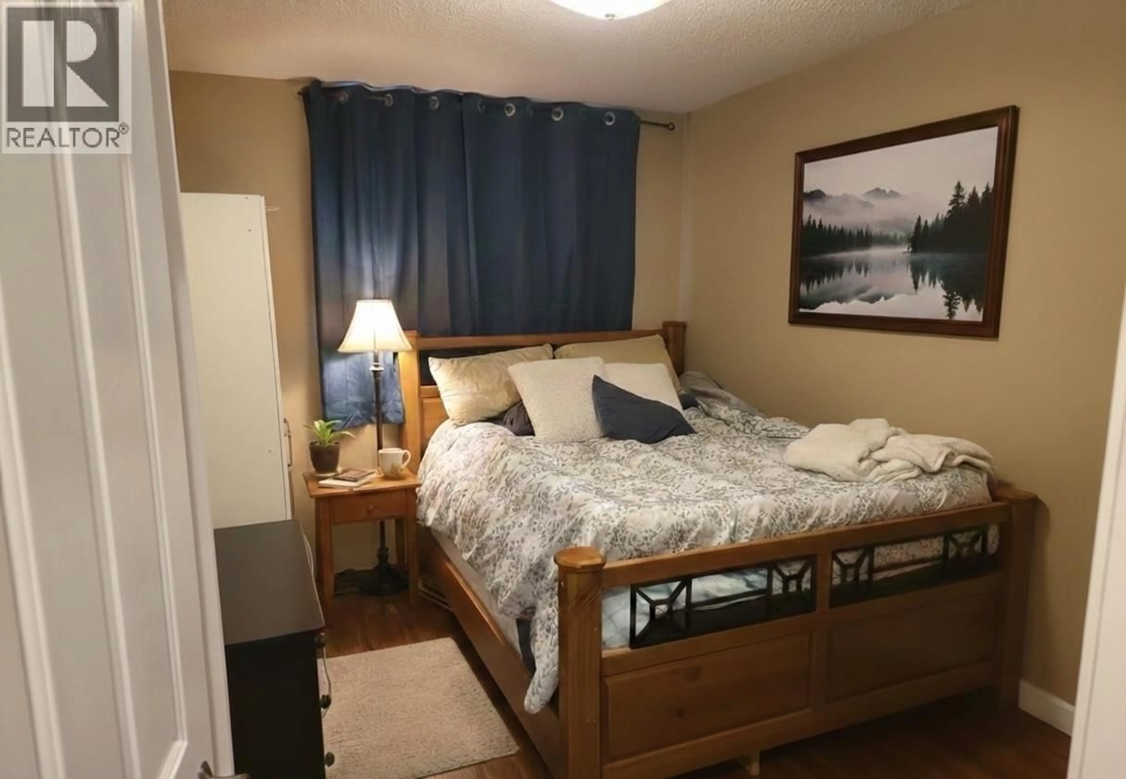 Bedroom with bed, wood/laminate floor for 2465 DANALLANKO DRIVE, Armstrong British Columbia V0E1B1