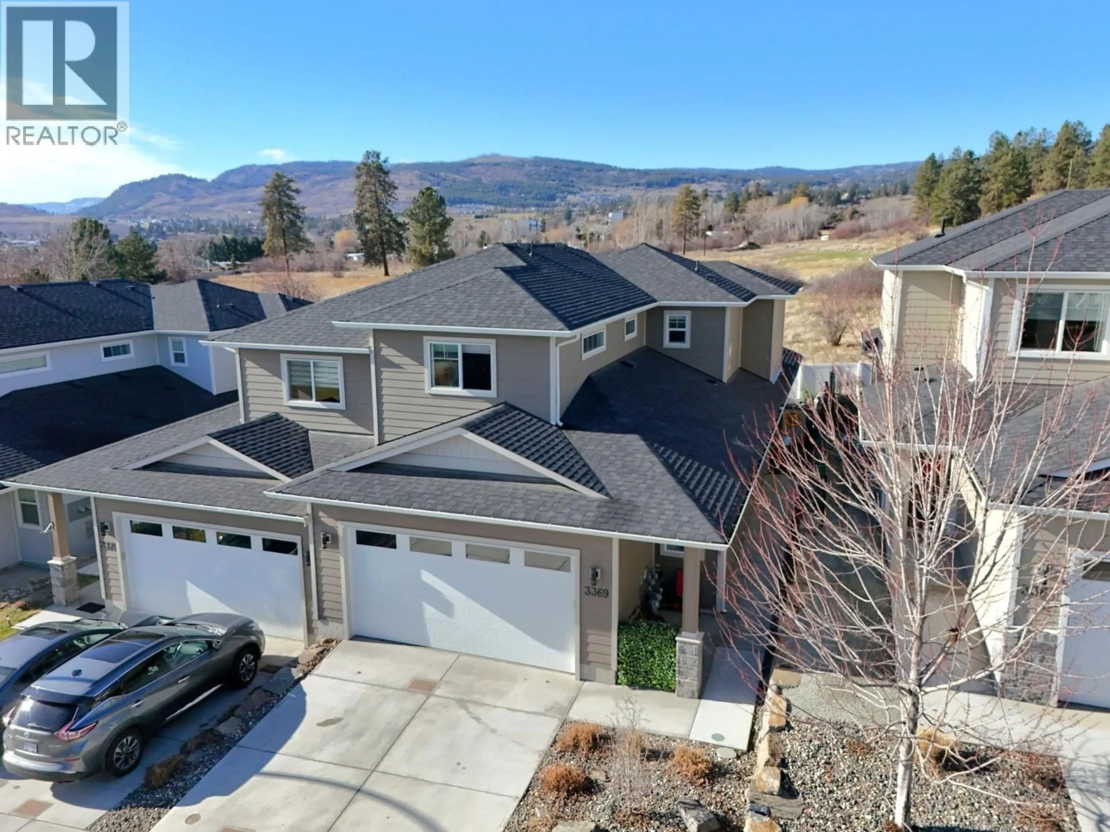 A pic from outside/outdoor area/front of a property/back of a property/a pic from drone, mountain view for 3369 HAWKS CRESCENT, Westbank British Columbia V4T0A7