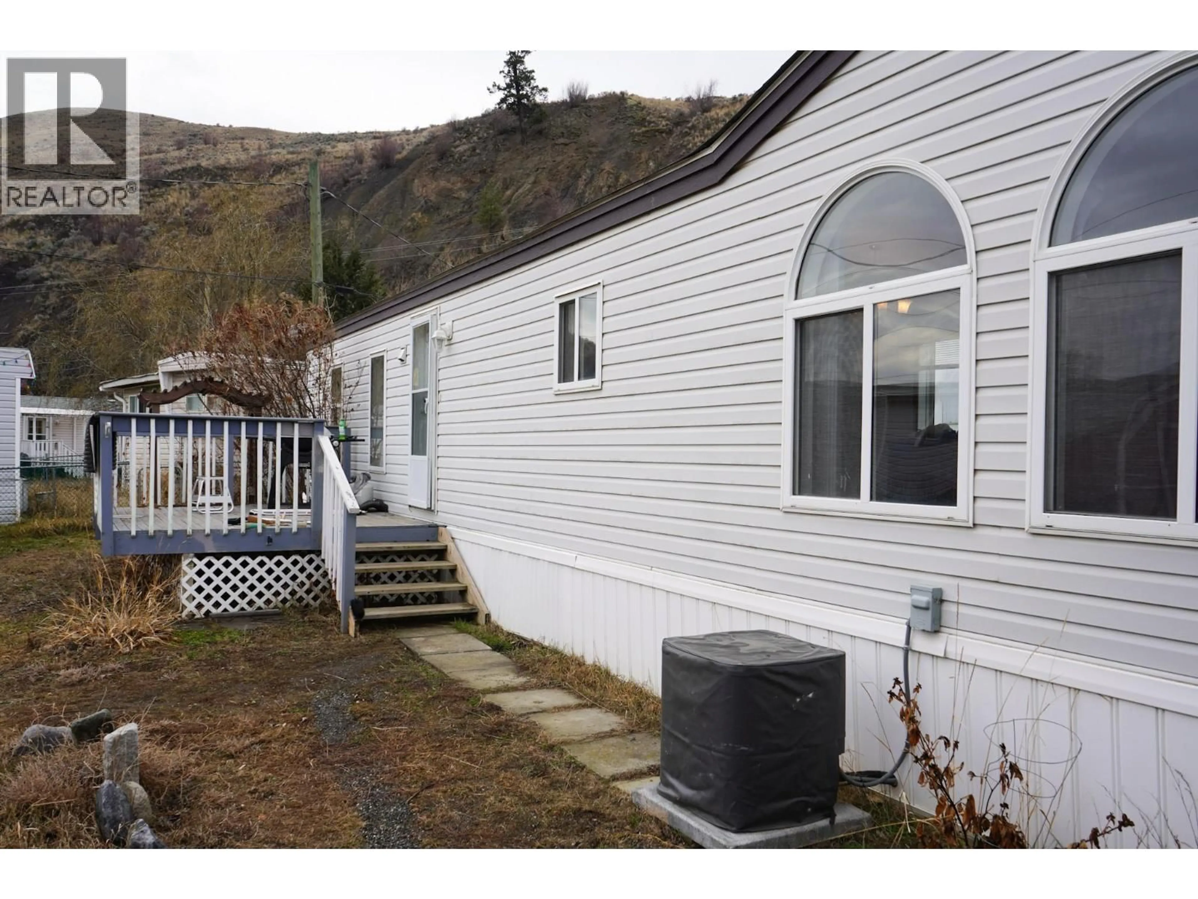 Home with vinyl exterior material, mountain view for 7 - 1321 OLD CARIBOO ROAD, Cache Creek British Columbia V0K1H0