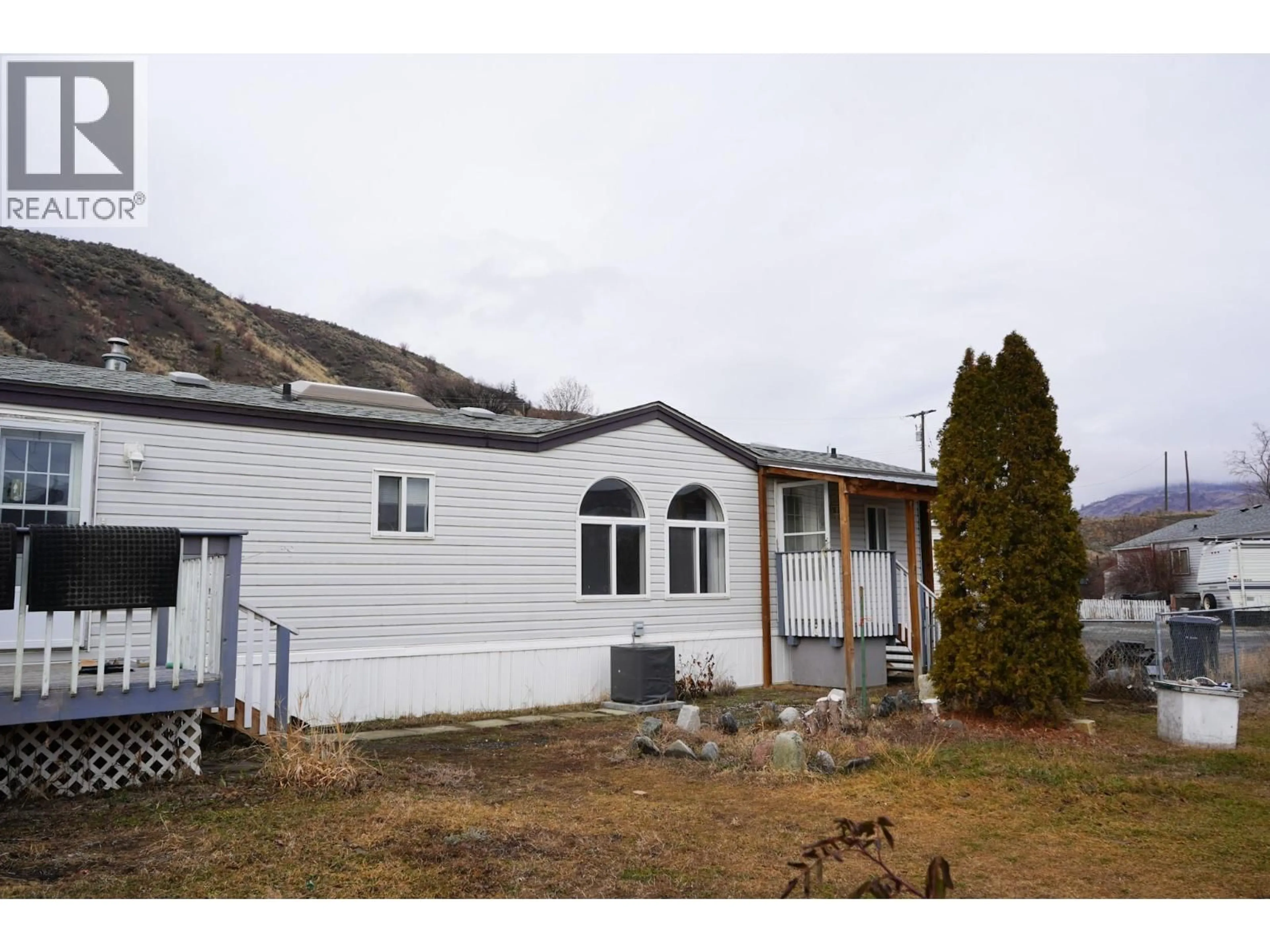Home with vinyl exterior material, mountain view for 7 - 1321 OLD CARIBOO ROAD, Cache Creek British Columbia V0K1H0