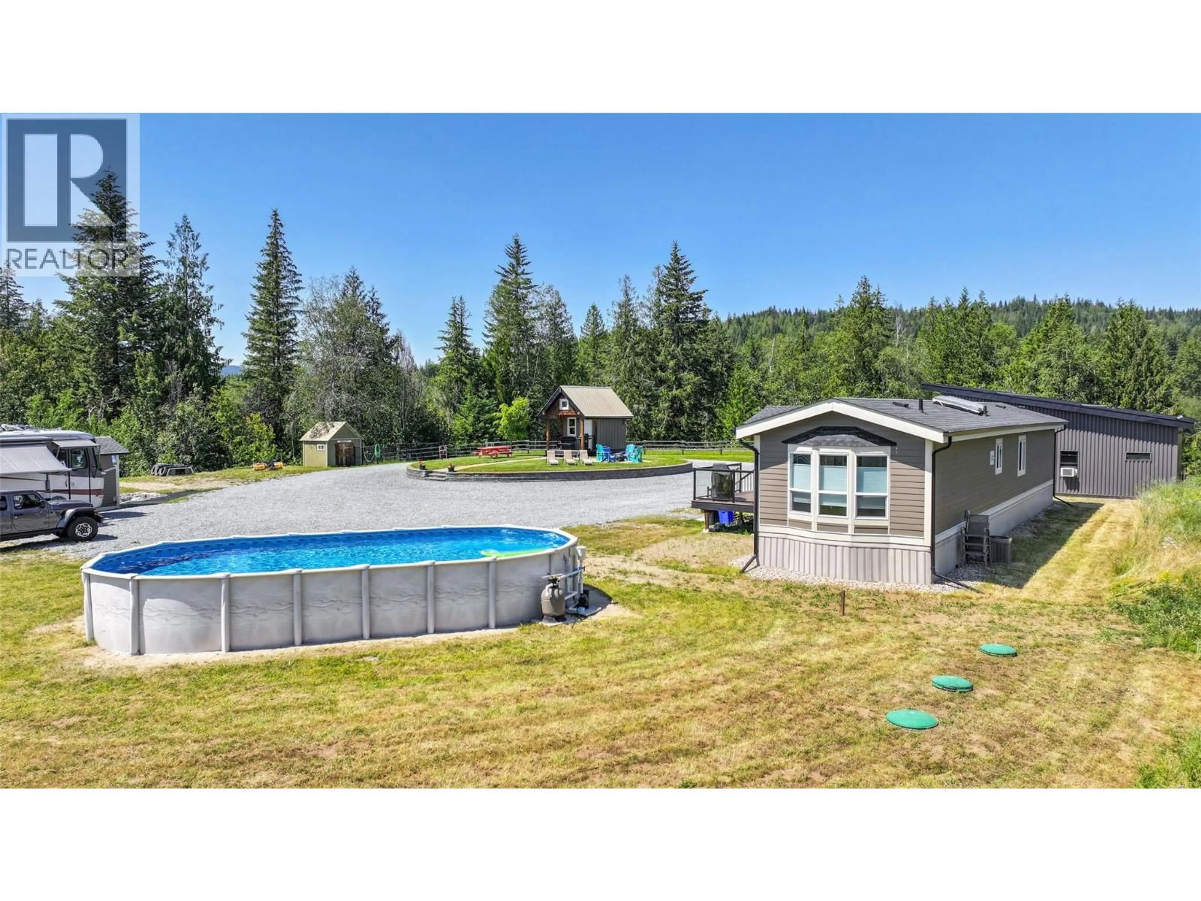 A pic from outside/outdoor area/front of a property/back of a property/a pic from drone, water/lake/river/ocean view for 781 GRANDVIEW BENCH ROAD, Salmon Arm British Columbia V1E2X8