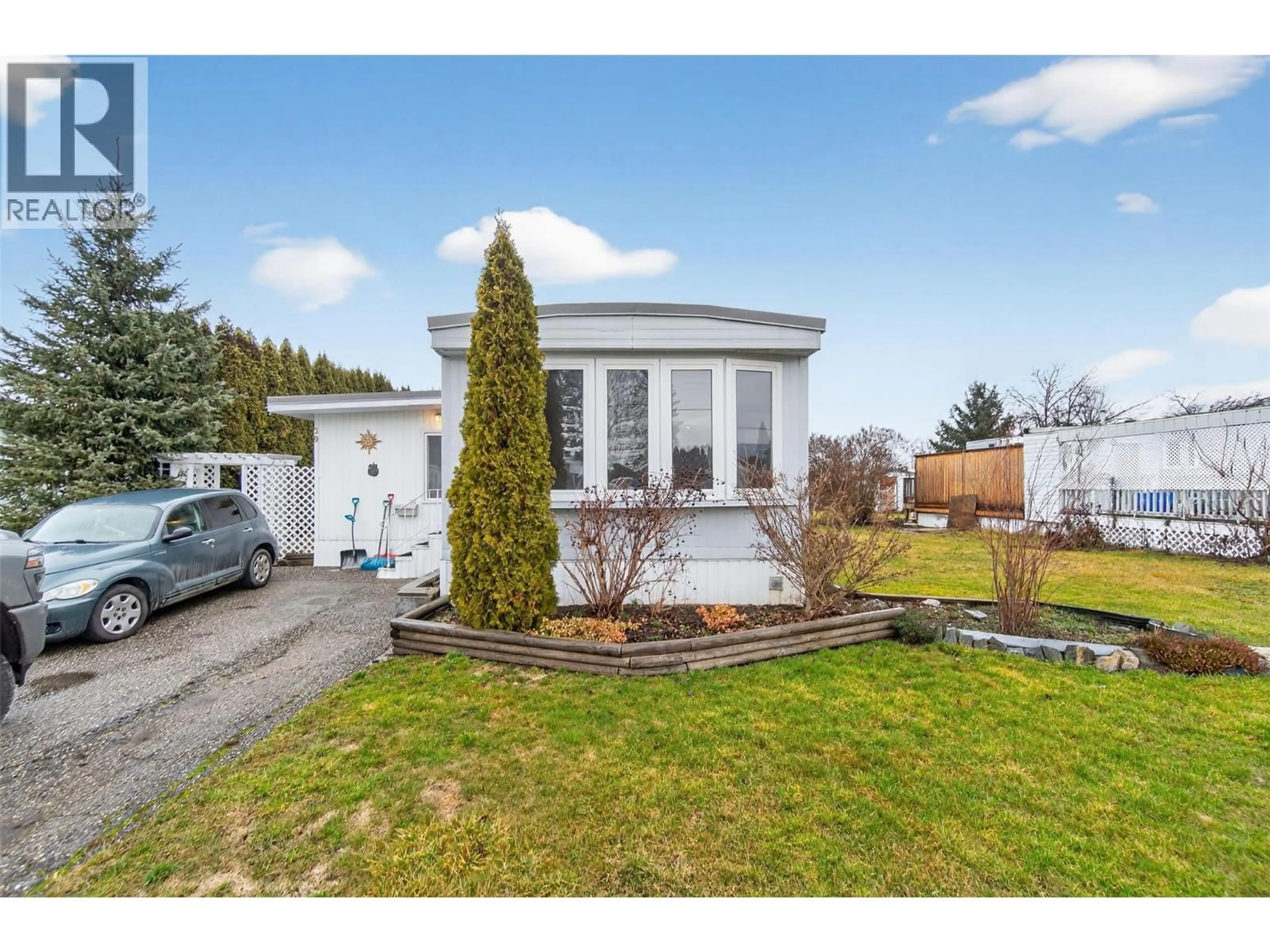 Home with vinyl exterior material, street for 39 - 136 MEADOW CRESCENT, Enderby British Columbia V0E1V0