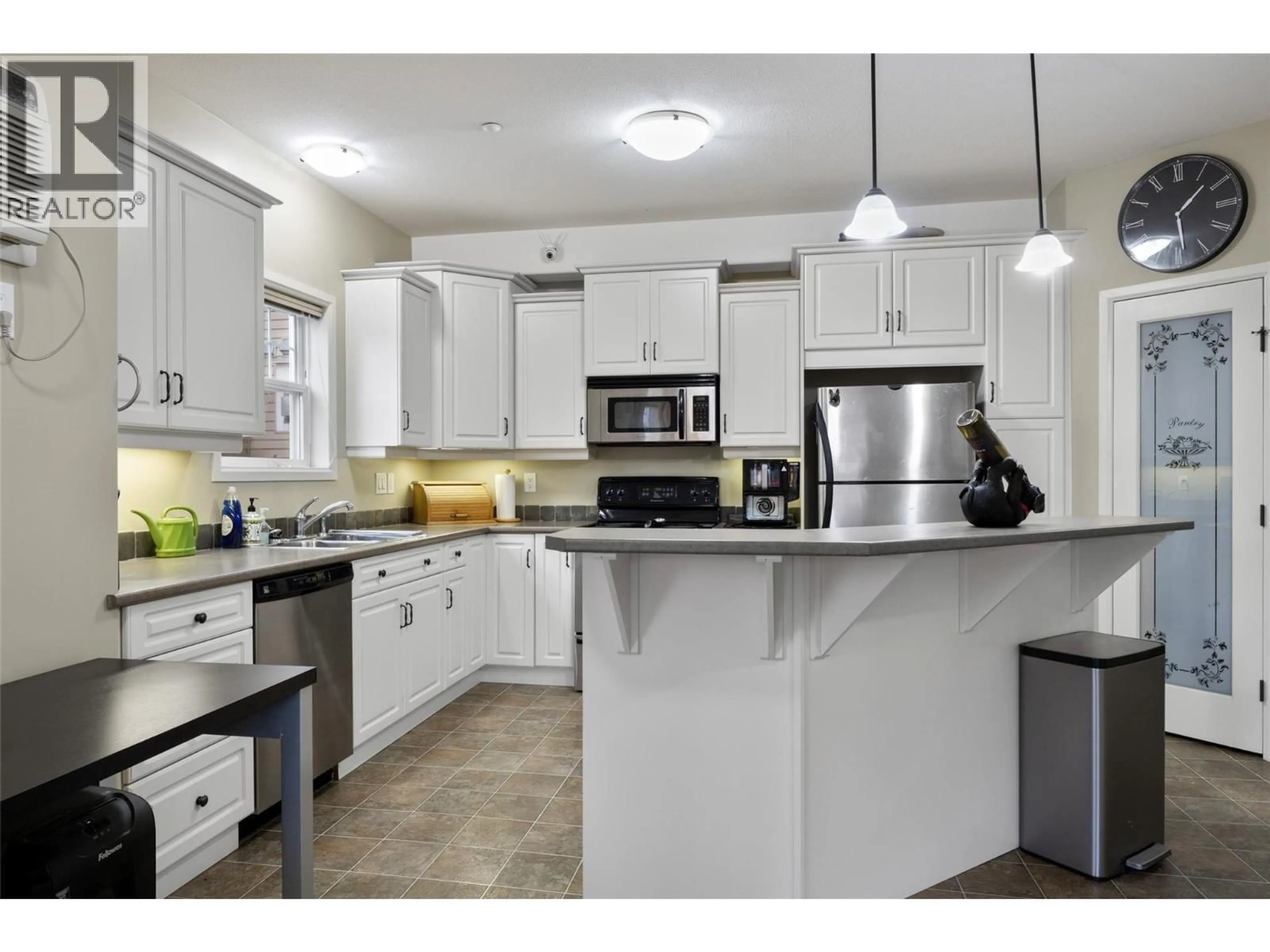 Open concept kitchen, ceramic/tile floor for 212 - 550 LORNE STREET, Kamloops British Columbia V2C1W3