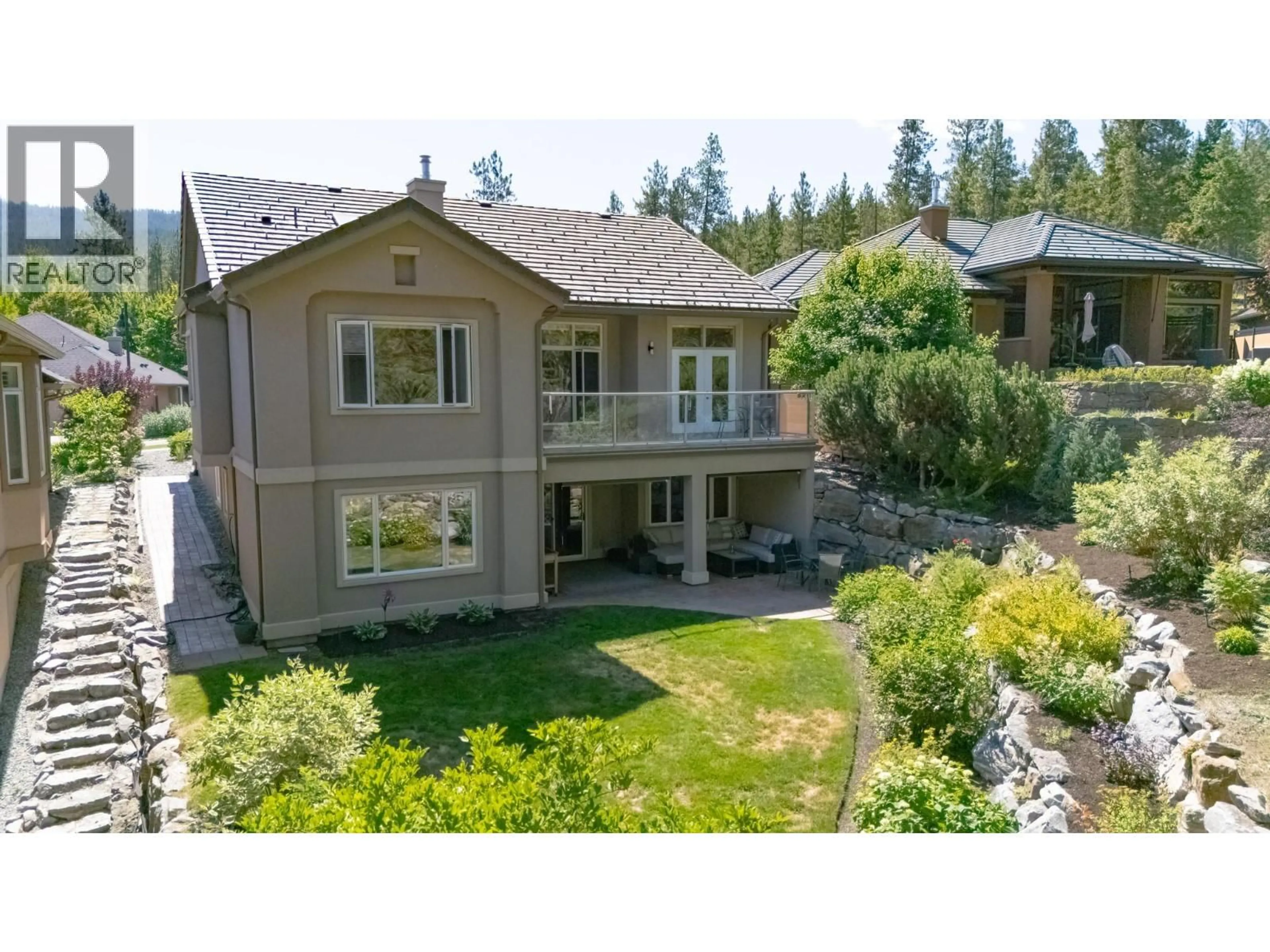 A pic from outside/outdoor area/front of a property/back of a property/a pic from drone, street for 4432 GALLAGHERS FOREST SOUTH, Kelowna British Columbia V1W4X3