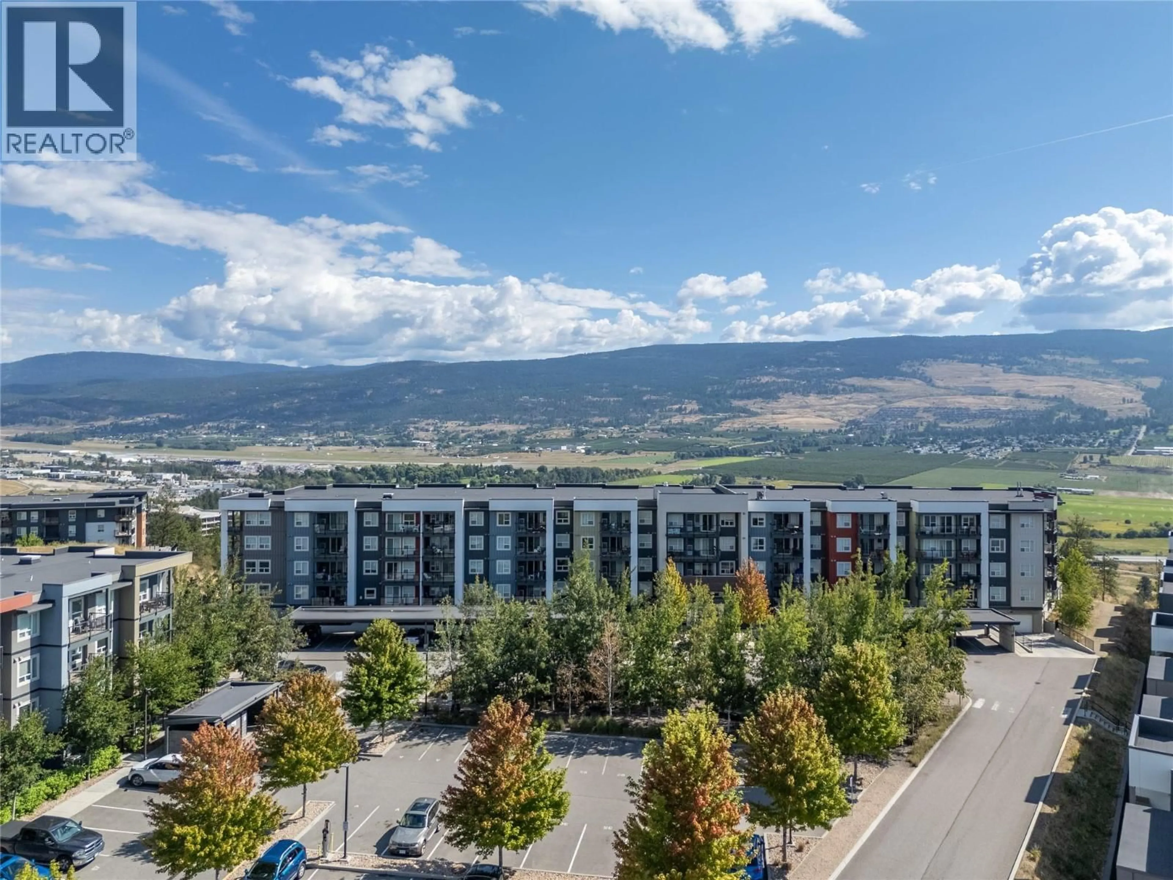 A pic from outside/outdoor area/front of a property/back of a property/a pic from drone, mountain view for PH17 - 775 ACADEMY WAY, Kelowna British Columbia V1V0A5