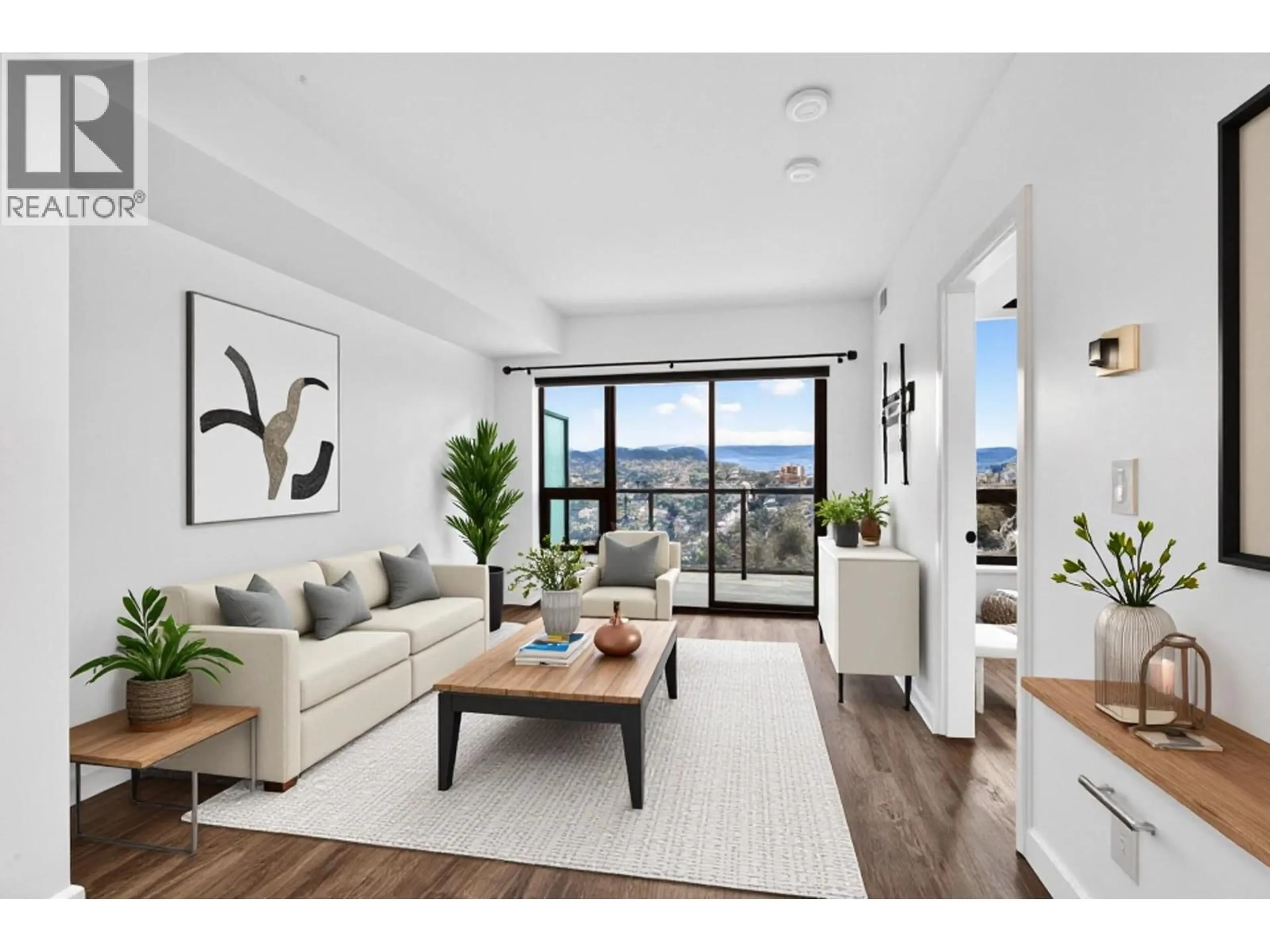 Living room with furniture, wood/laminate floor for 1301 - 1471 ST PAUL STREET, Kelowna British Columbia V1Y2E6