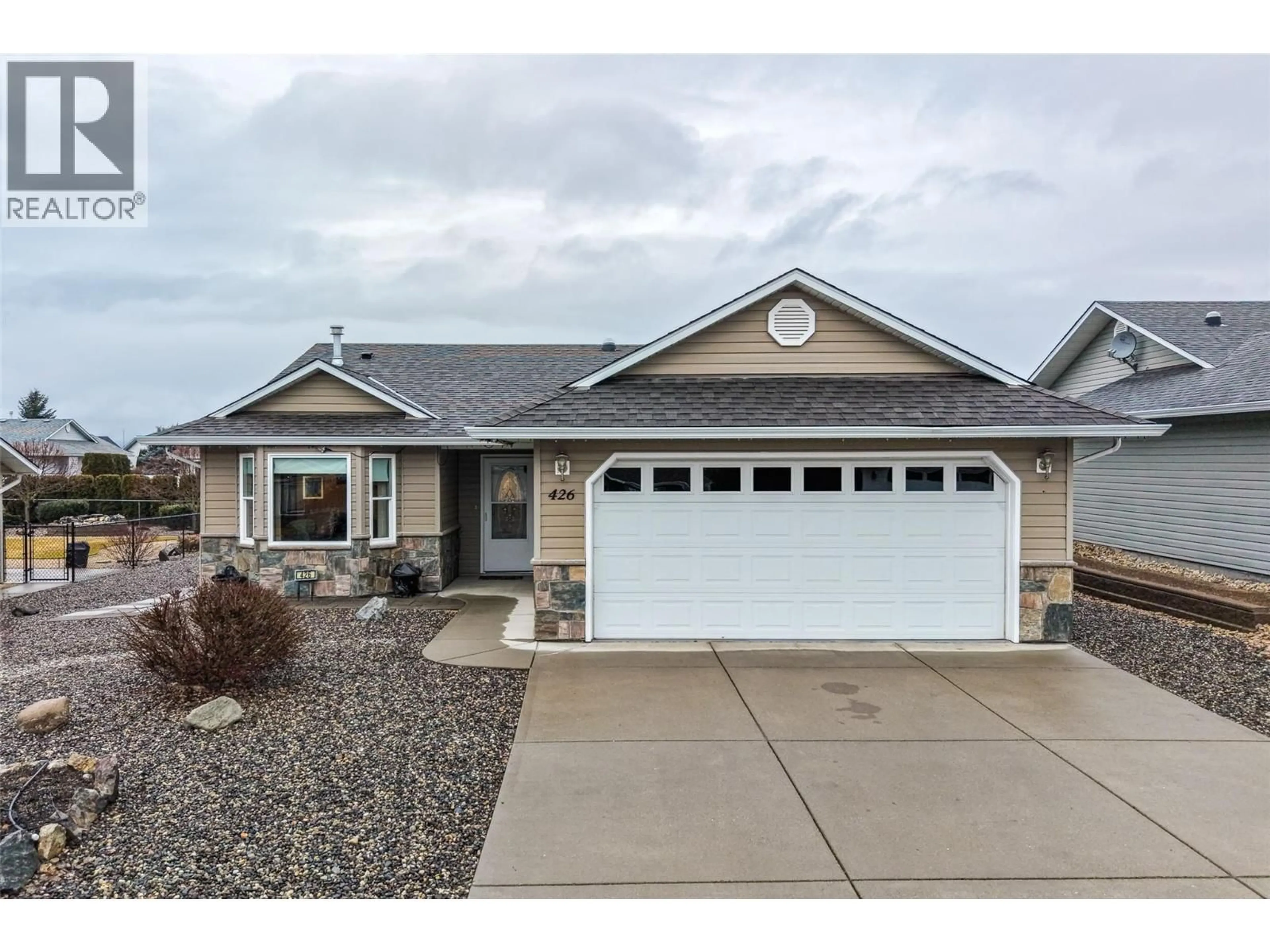 Home with vinyl exterior material, street for 426 4TH STREET, Vernon British Columbia V1H1Z1