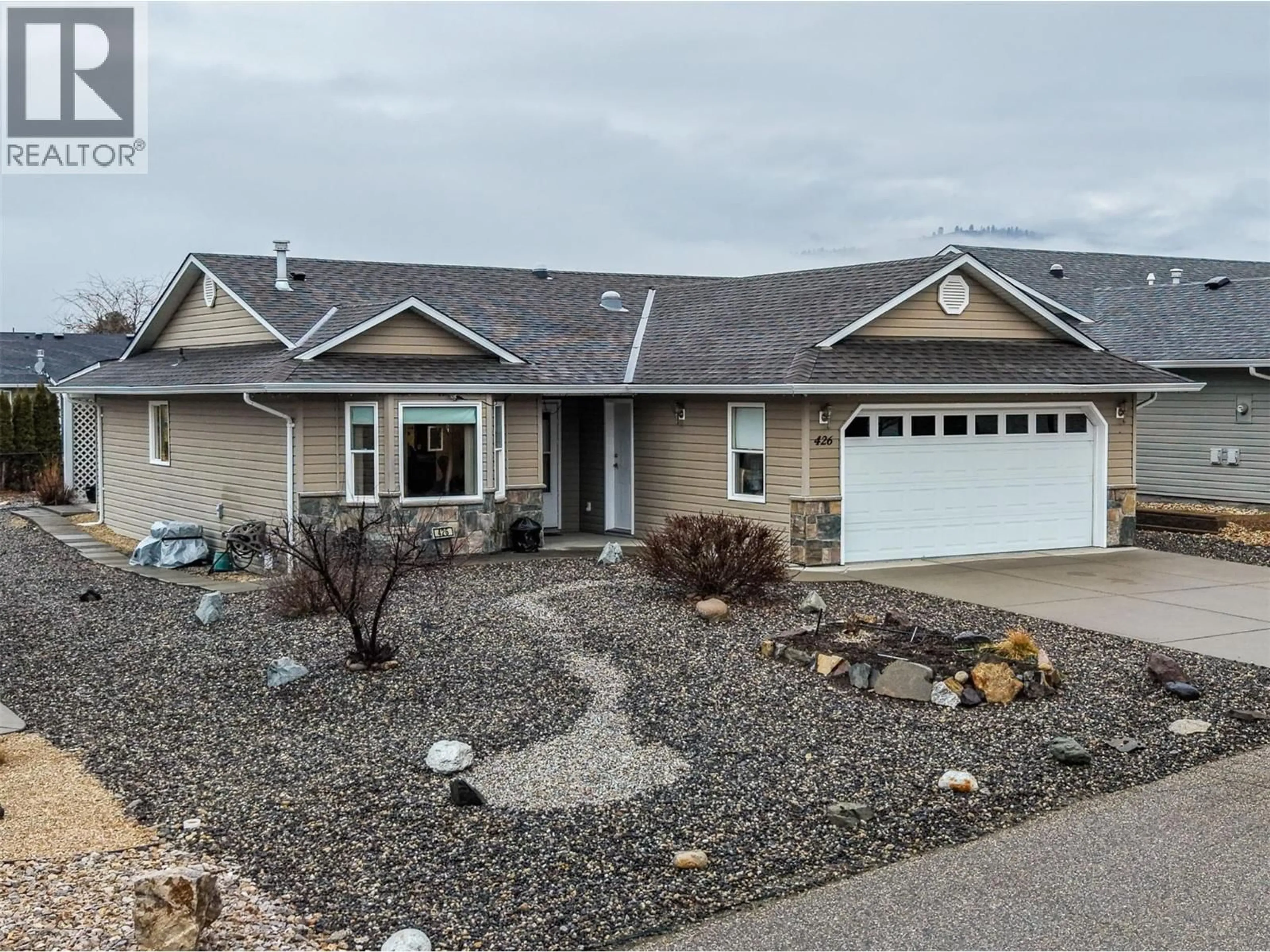 Home with vinyl exterior material, street for 426 4TH STREET, Vernon British Columbia V1H1Z1