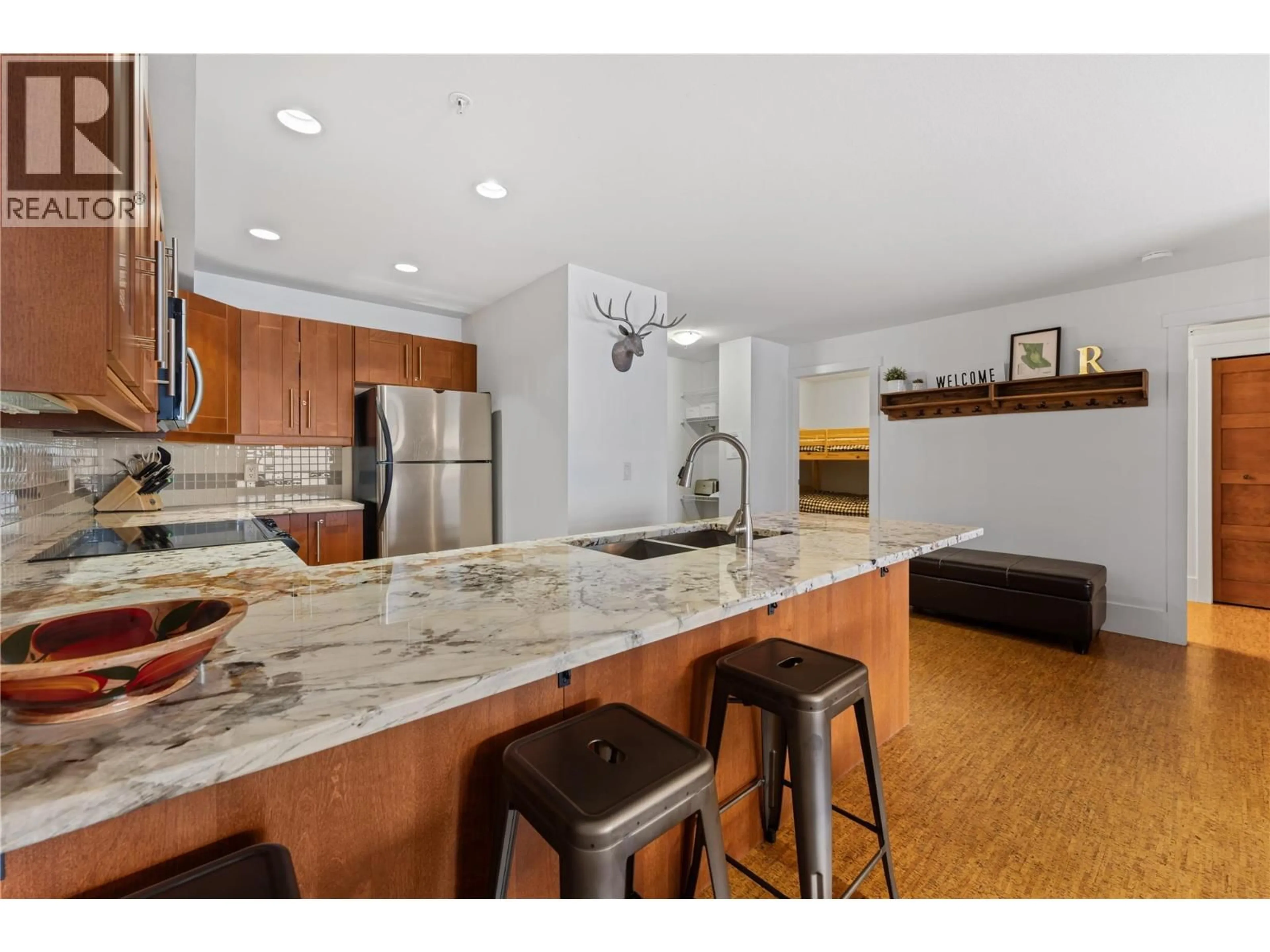 Open concept kitchen, unknown for 101 - 5030 SNOWBIRD WAY, Big White British Columbia V0H1A0