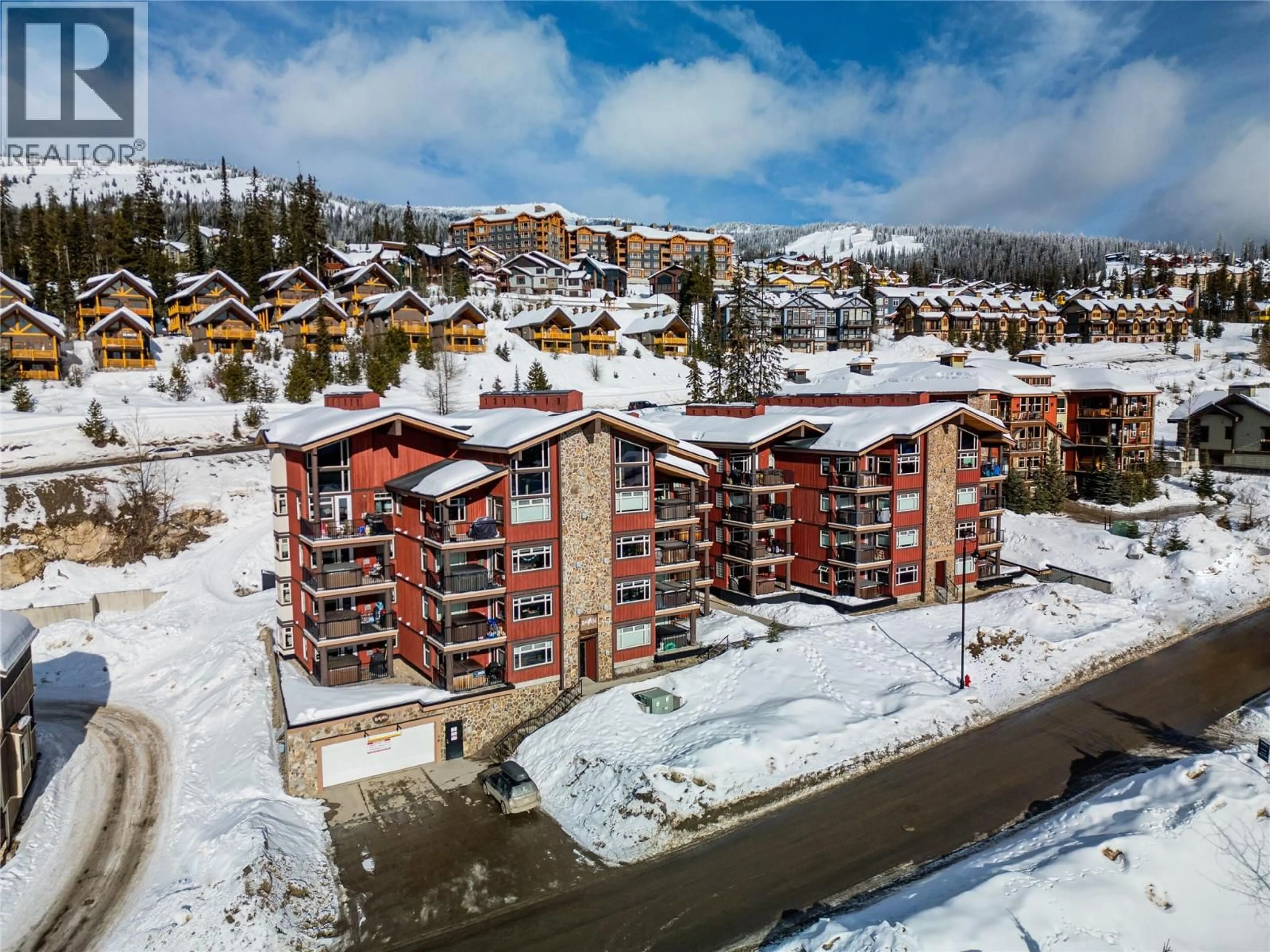 A pic from outside/outdoor area/front of a property/back of a property/a pic from drone, unknown for 101 - 5030 SNOWBIRD WAY, Big White British Columbia V0H1A0