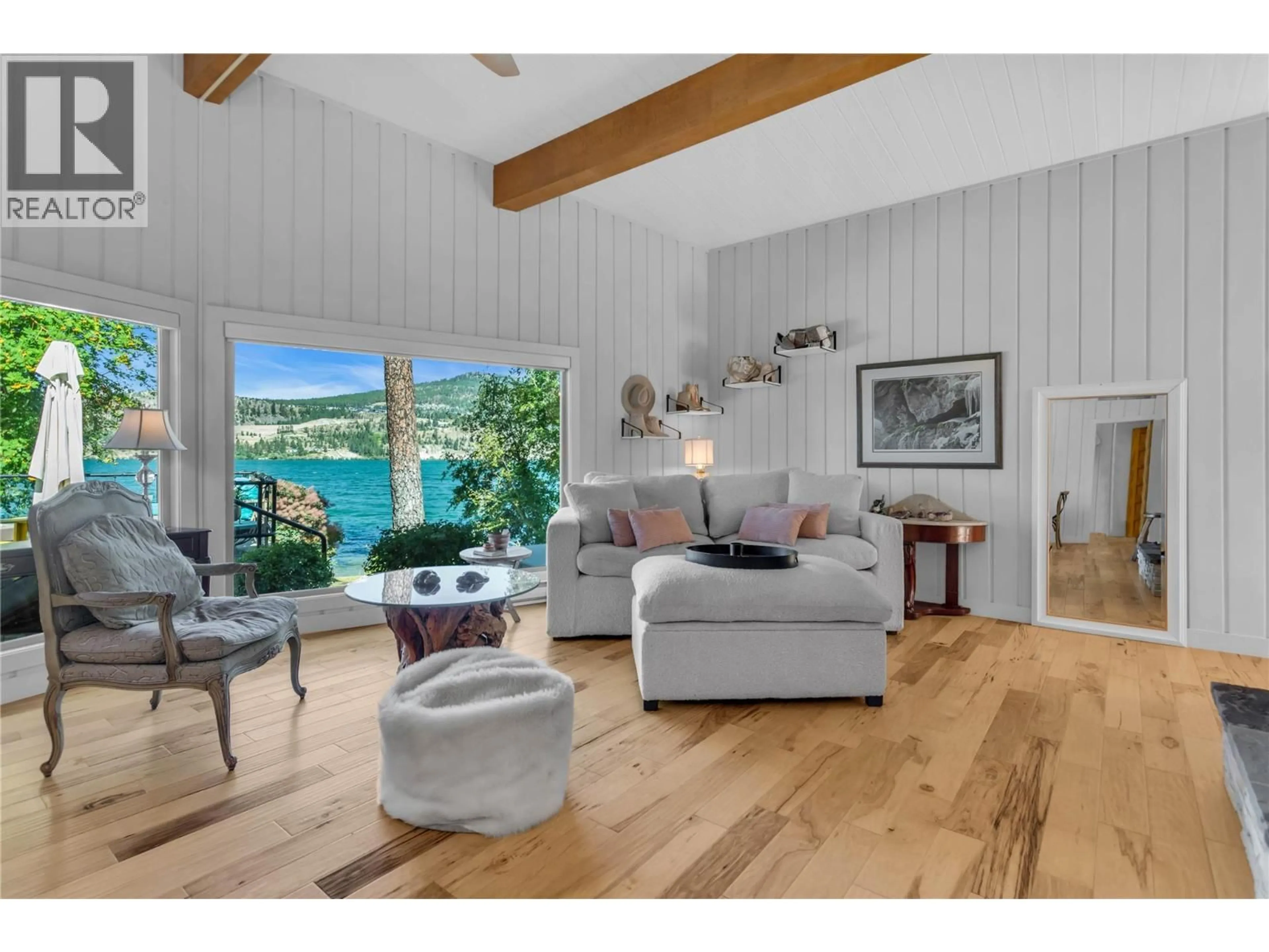 Living room with furniture, wood/laminate floor for 12110 TREWHITT ROAD WEST, Lake Country British Columbia V4V2A6