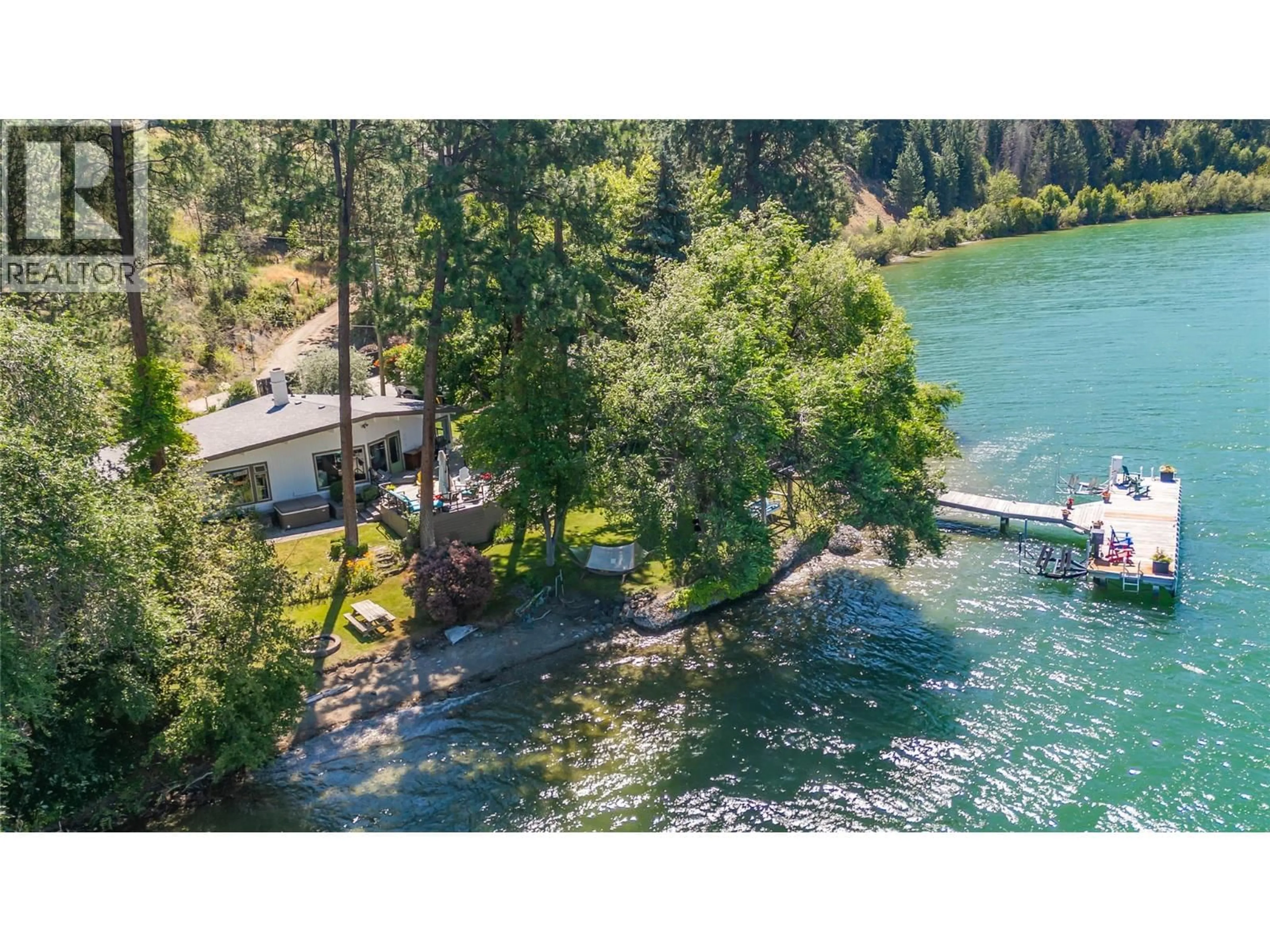 A pic from outside/outdoor area/front of a property/back of a property/a pic from drone, water/lake/river/ocean view for 12110 TREWHITT ROAD WEST, Lake Country British Columbia V4V2A6