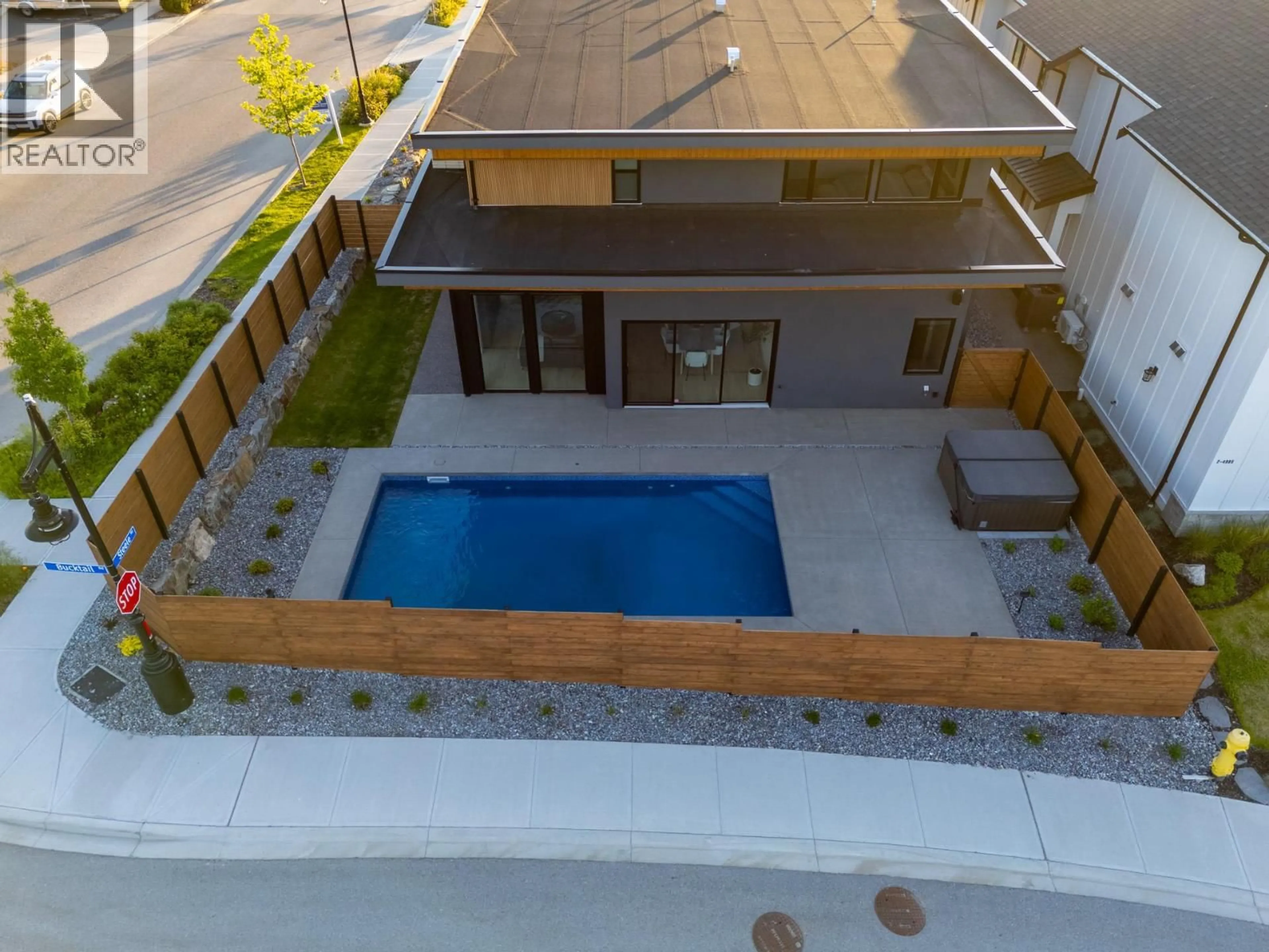 A pic from outside/outdoor area/front of a property/back of a property/a pic from drone, street for 4983 BUCKTAIL LANE, Kelowna British Columbia V1W5L3