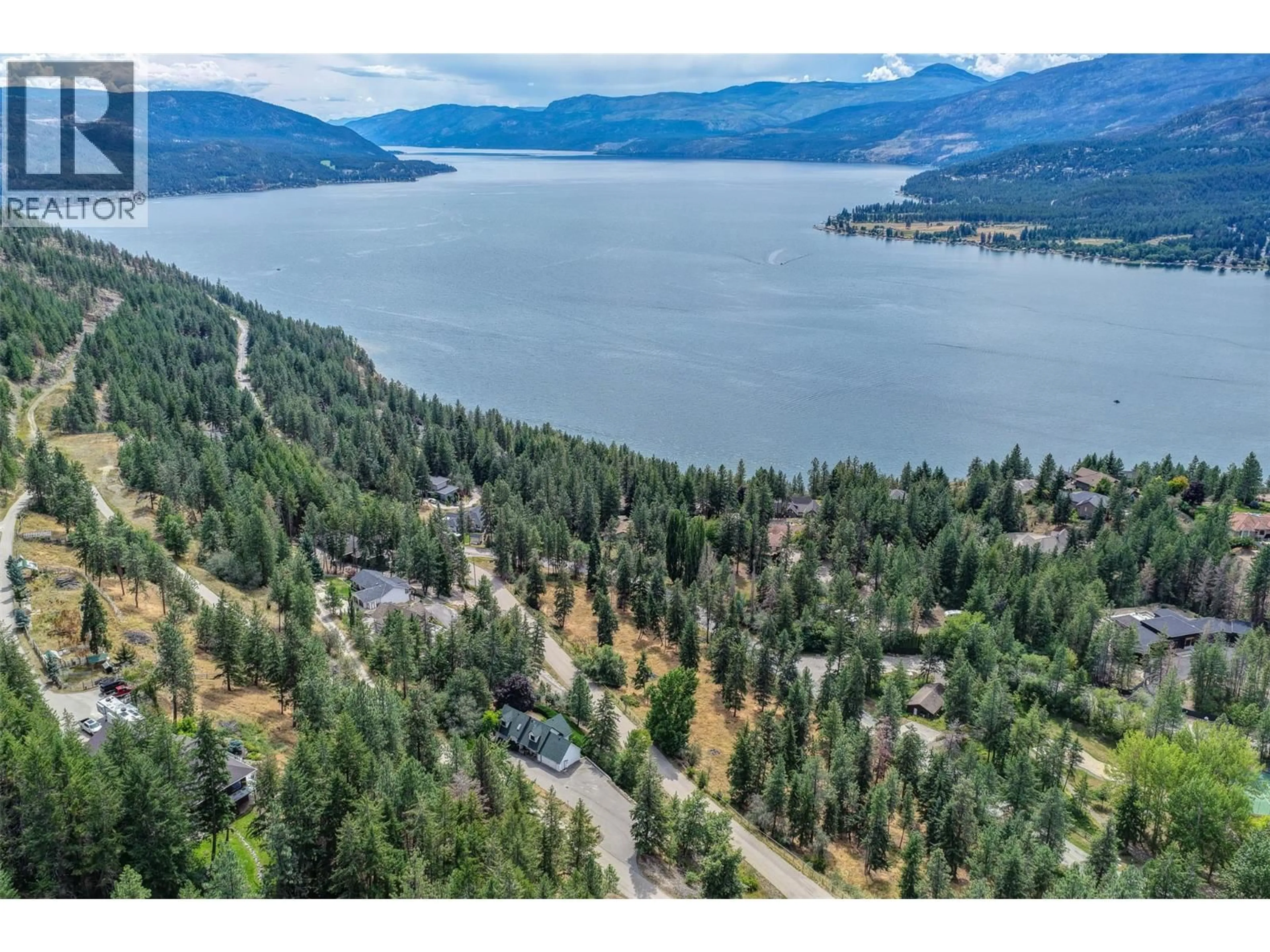A pic from outside/outdoor area/front of a property/back of a property/a pic from drone, water/lake/river/ocean view for 133 GOLDCLAIM ROAD, Vernon British Columbia V1H1H2