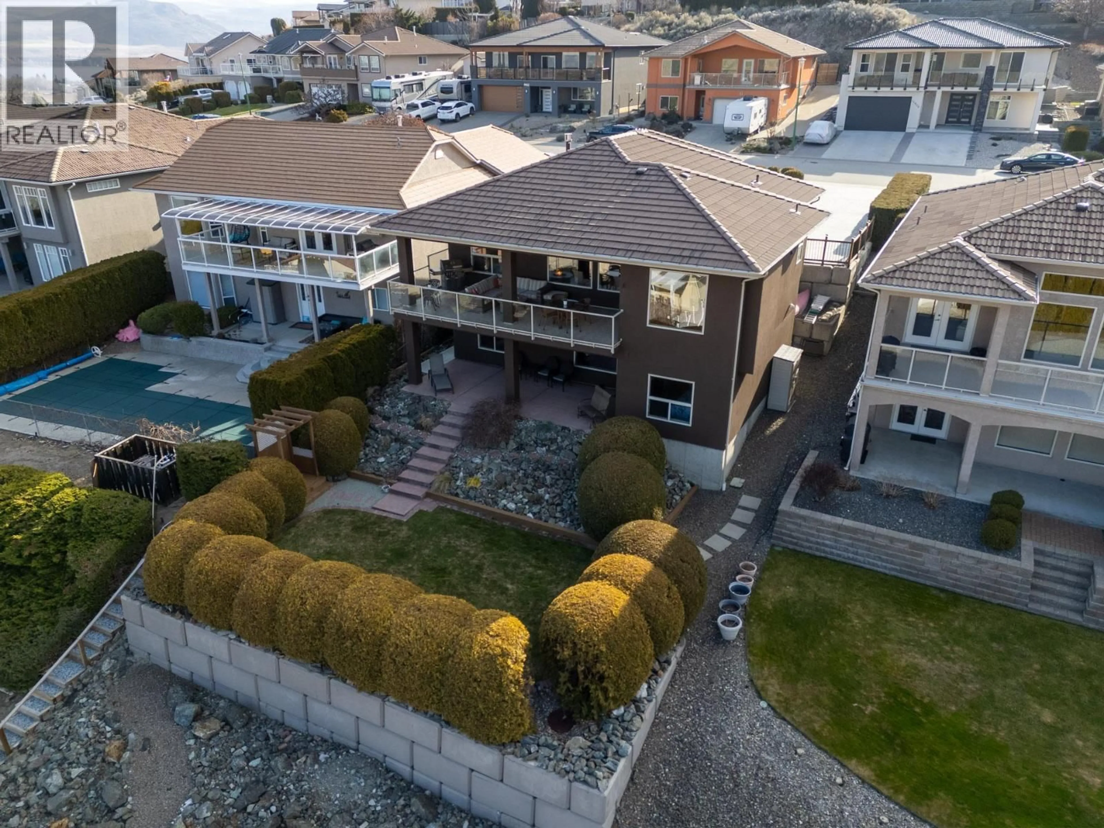 A pic from outside/outdoor area/front of a property/back of a property/a pic from drone, street for 11909 LA COSTA LANE, Osoyoos British Columbia V0H1V4