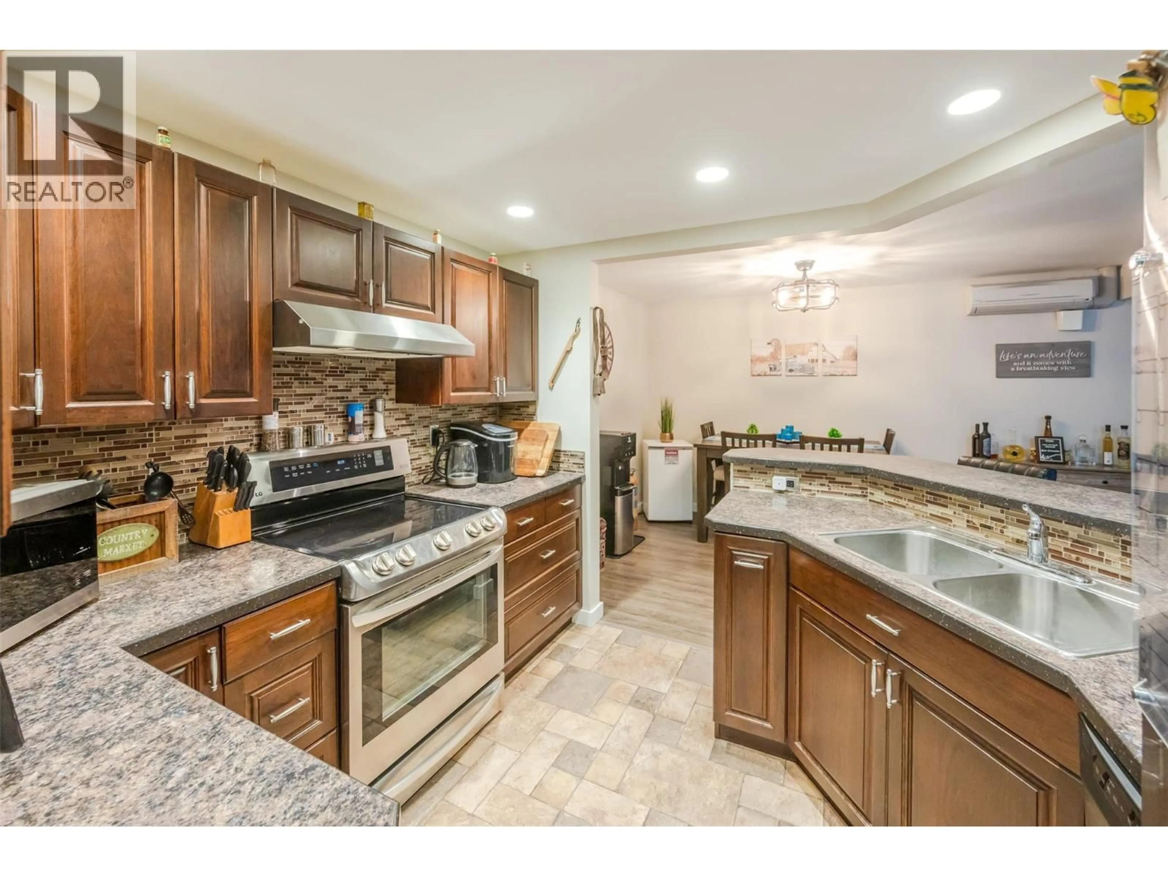 Open concept kitchen, ceramic/tile floor for 216 - 337 MCKINNEY ROAD, Oliver British Columbia V0H1T3