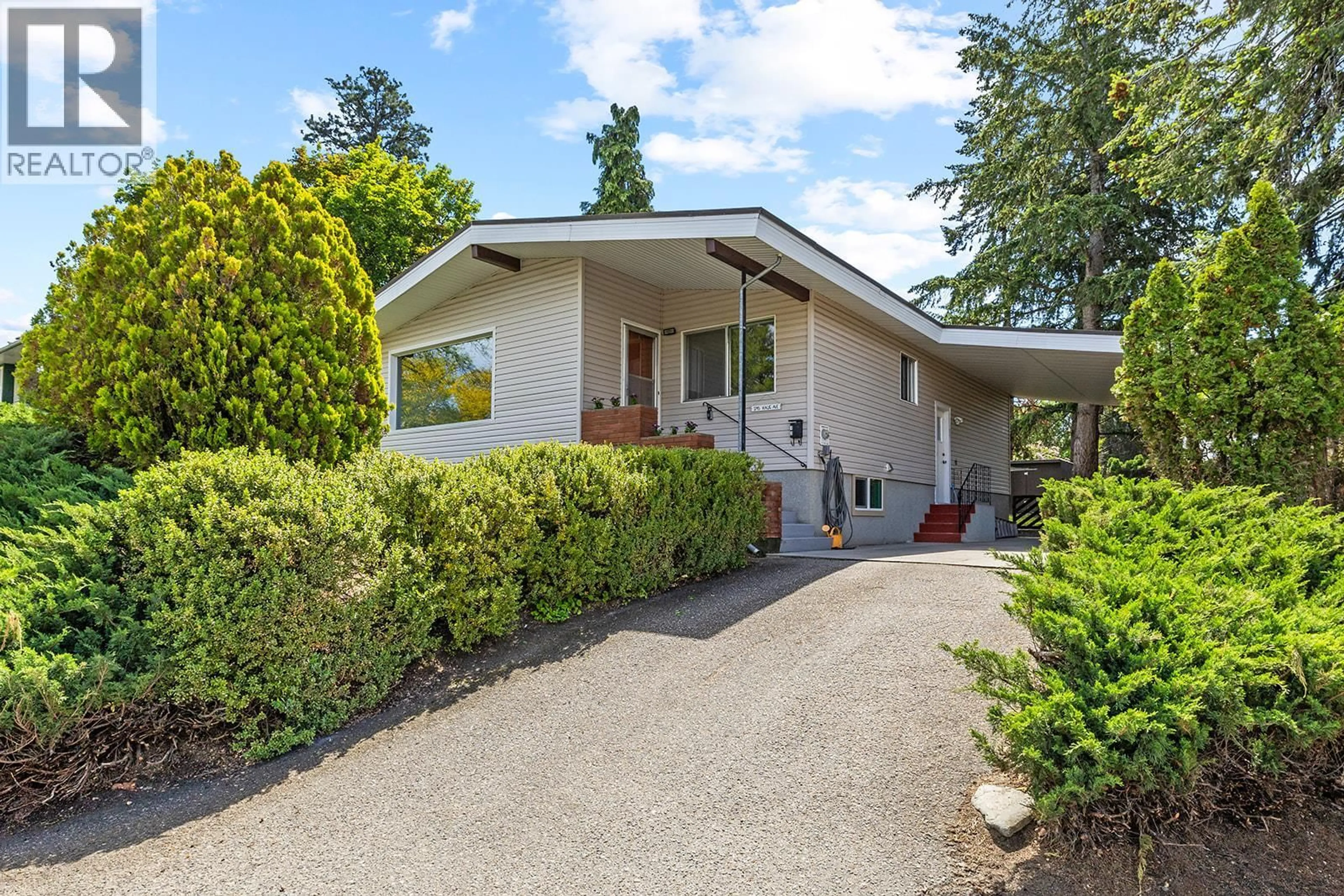 Home with vinyl exterior material, street for 1745 HAUG AVENUE, Kelowna British Columbia V1Y4M3