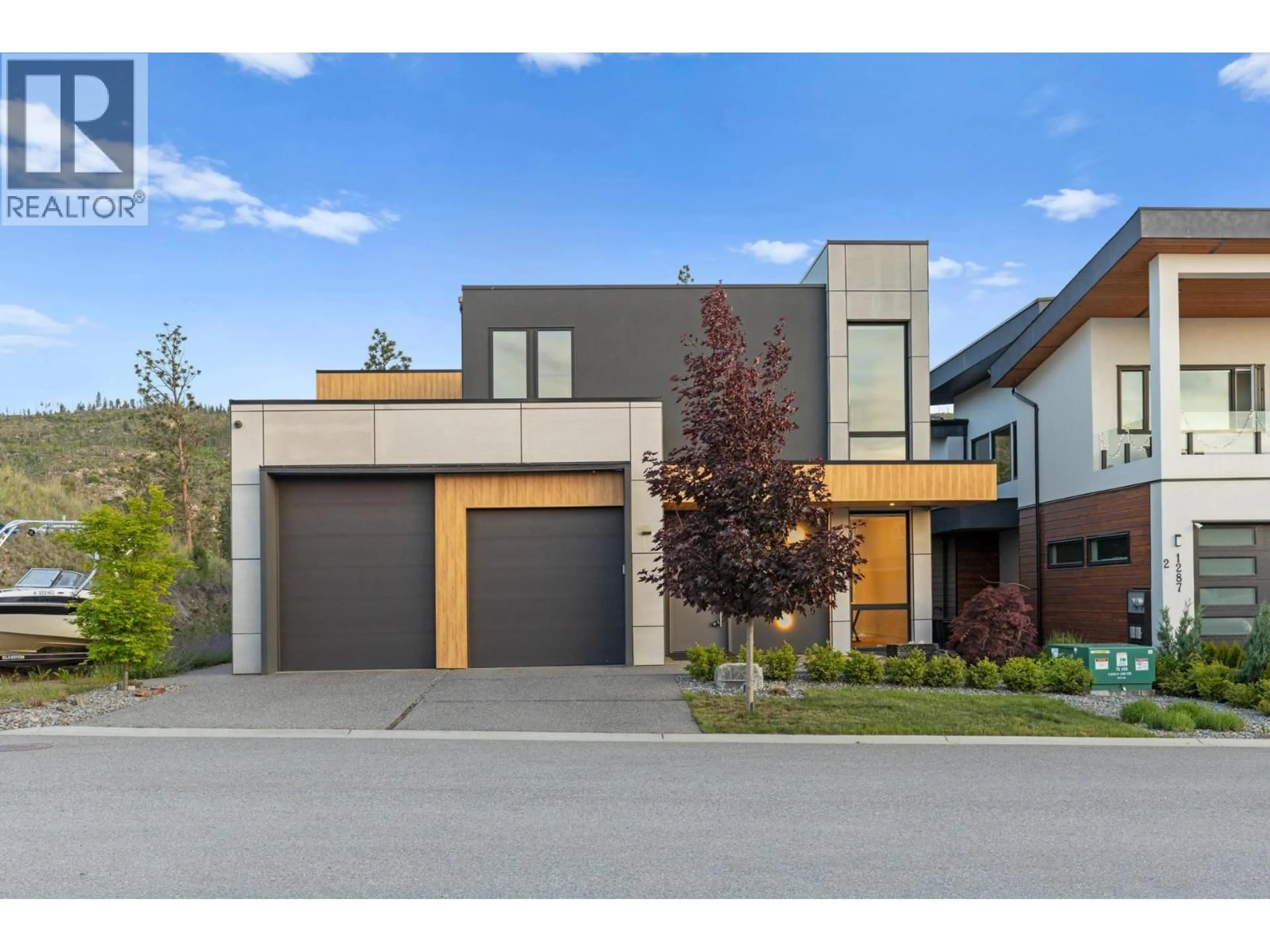 Home with brick exterior material, street for 1297 JACK SMITH ROAD, Kelowna British Columbia V1W5K7