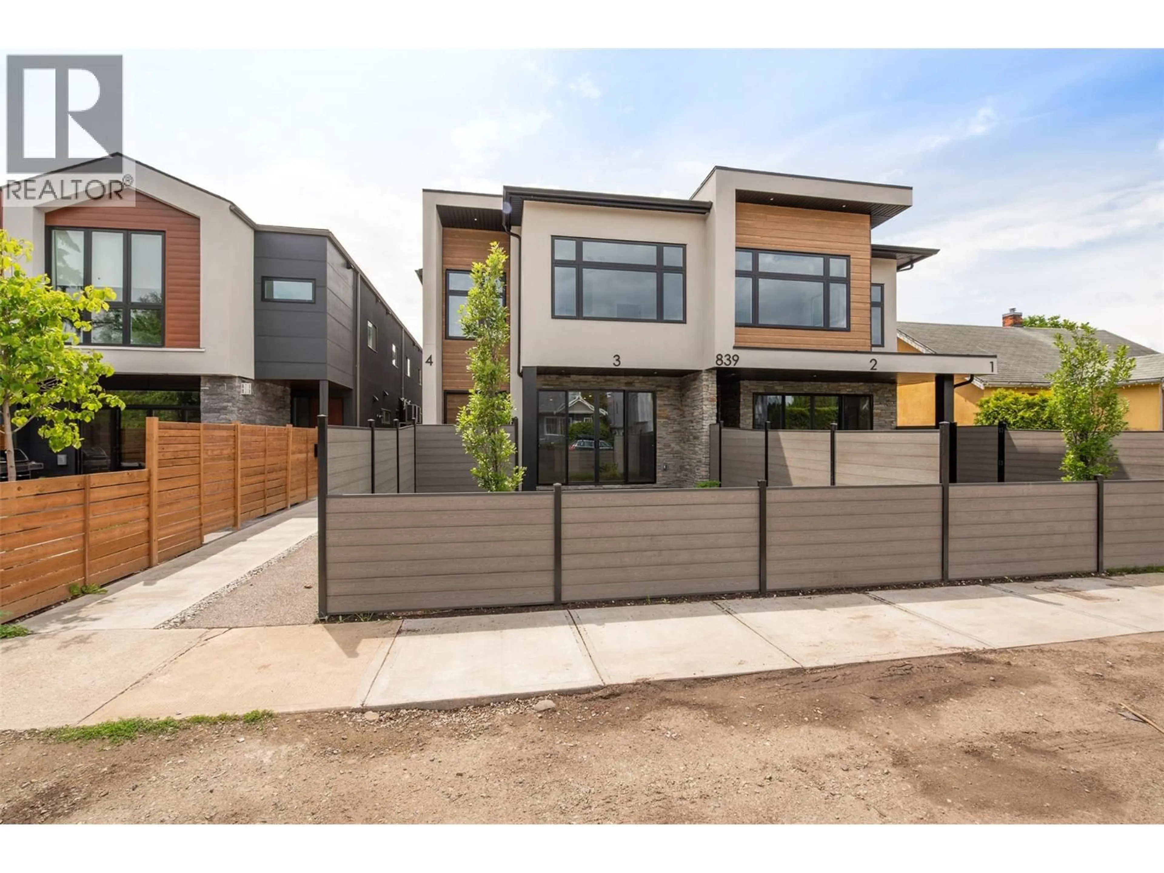Home with brick exterior material, street for 4 - 839 LAWSON AVENUE, Kelowna British Columbia V1Y6S9
