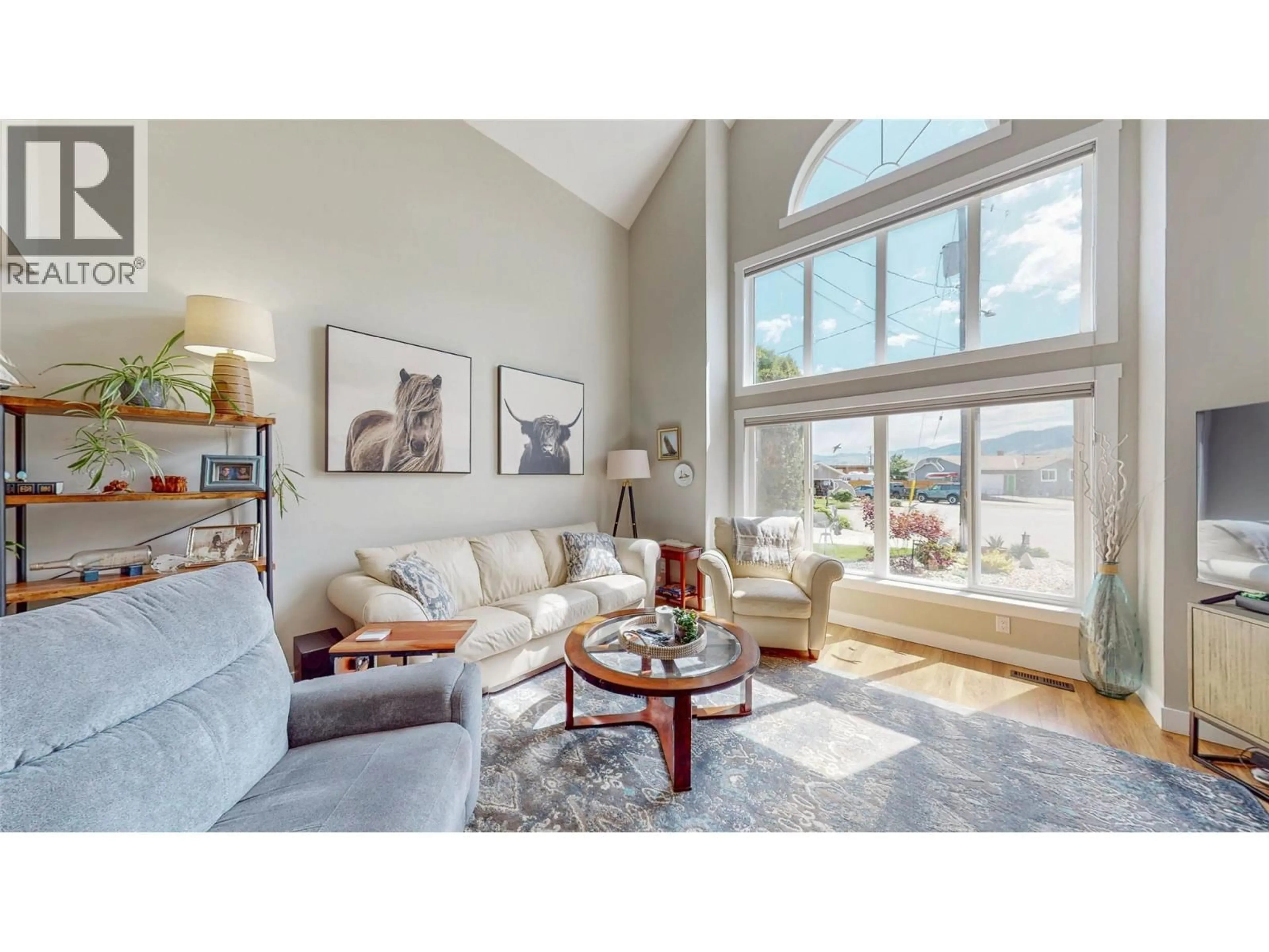 Living room with furniture, wood/laminate floor for 5896 FAIRVIEW PLACE, Oliver British Columbia V0H1T1