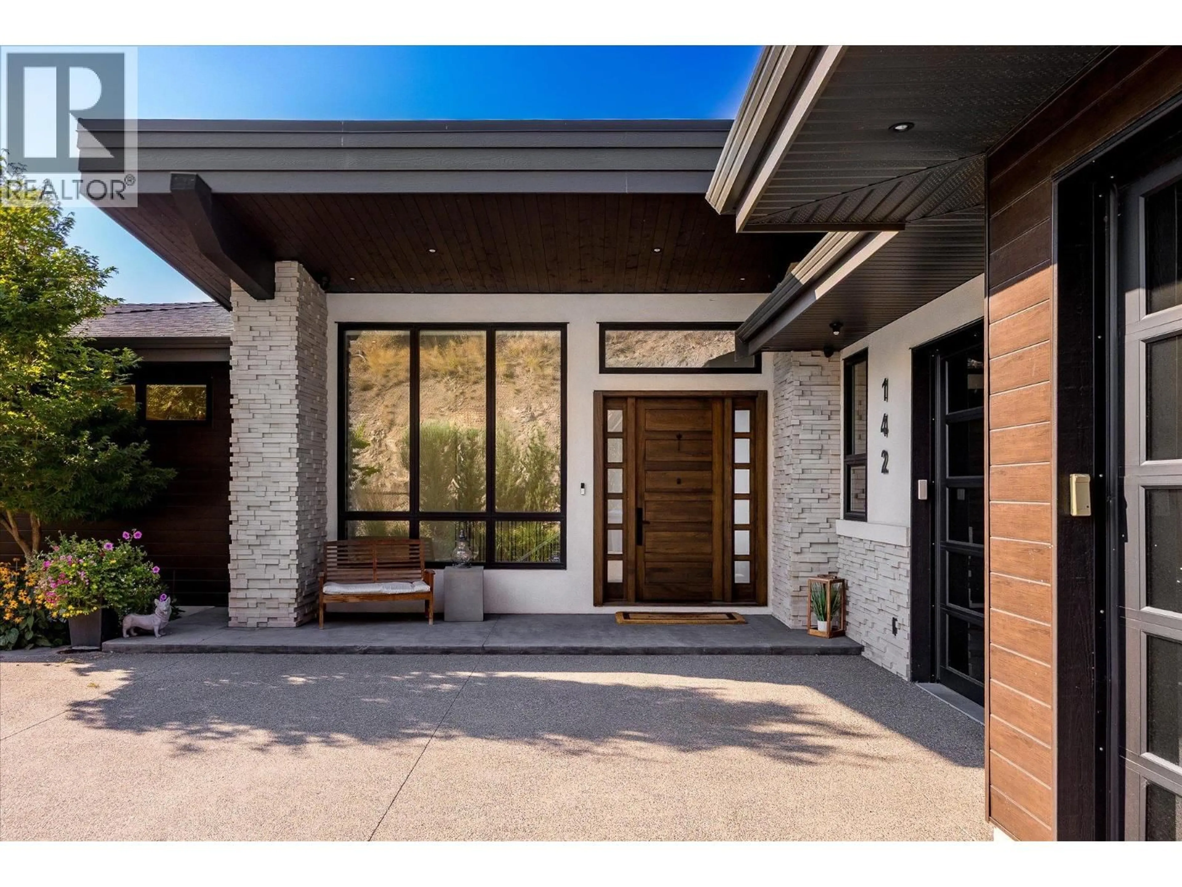 Home with brick exterior material, street for 142 RED SKY COURT, Kelowna British Columbia V1V3G4