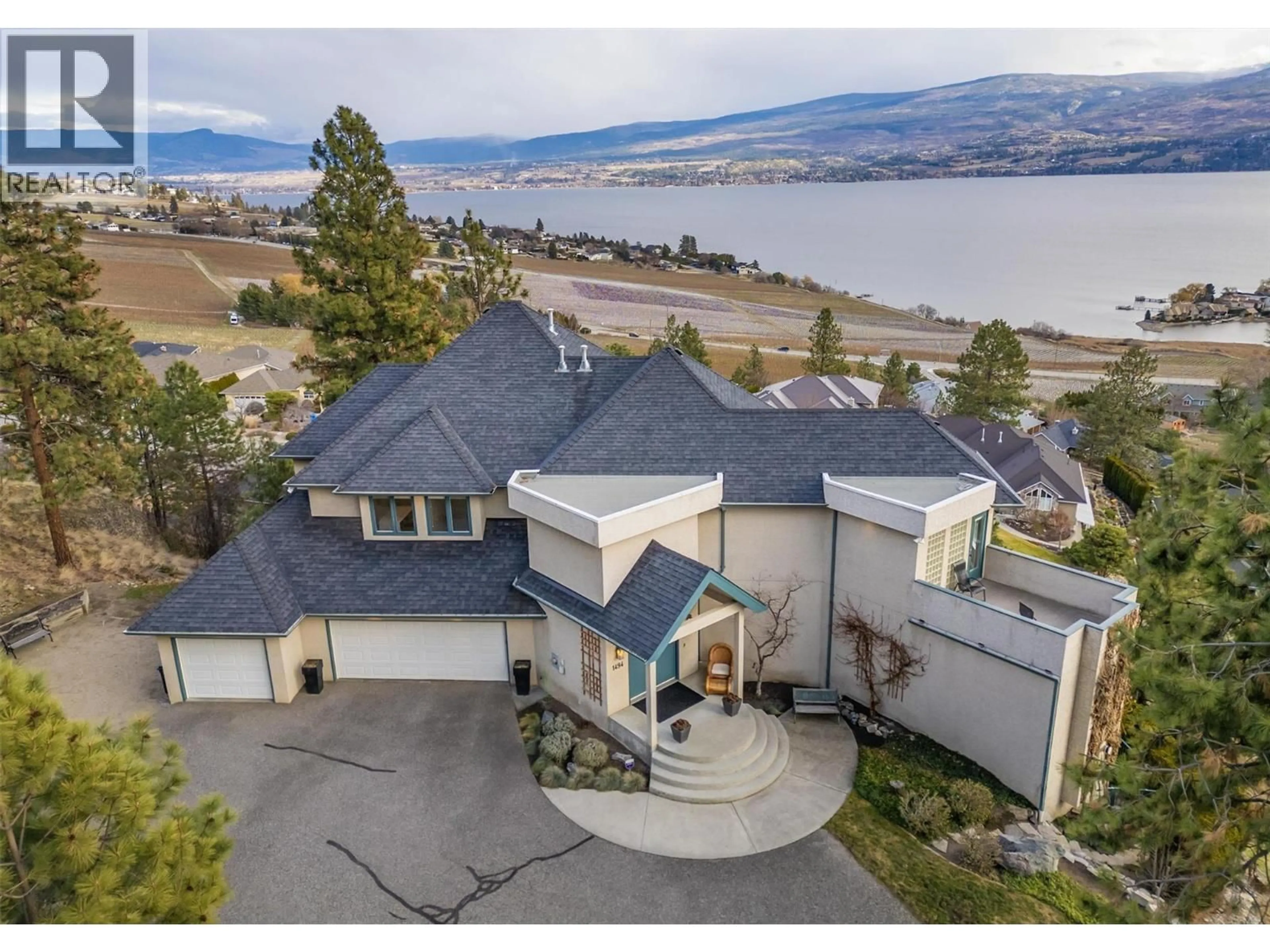 A pic from outside/outdoor area/front of a property/back of a property/a pic from drone, water/lake/river/ocean view for 1494 CHARDONNAY PLACE, West Kelowna British Columbia V4T2P9