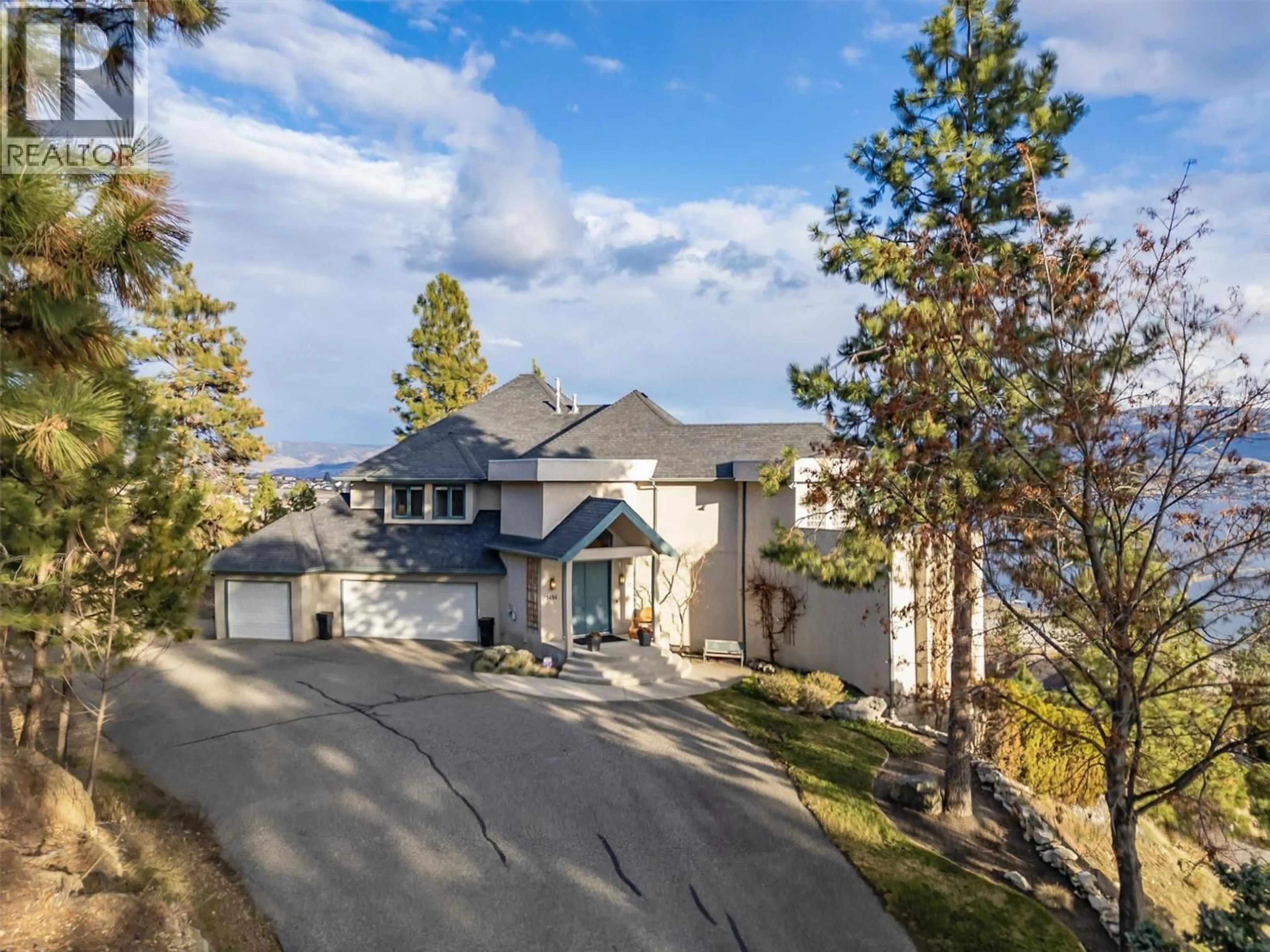 A pic from outside/outdoor area/front of a property/back of a property/a pic from drone, mountain view for 1494 CHARDONNAY PLACE, West Kelowna British Columbia V4T2P9