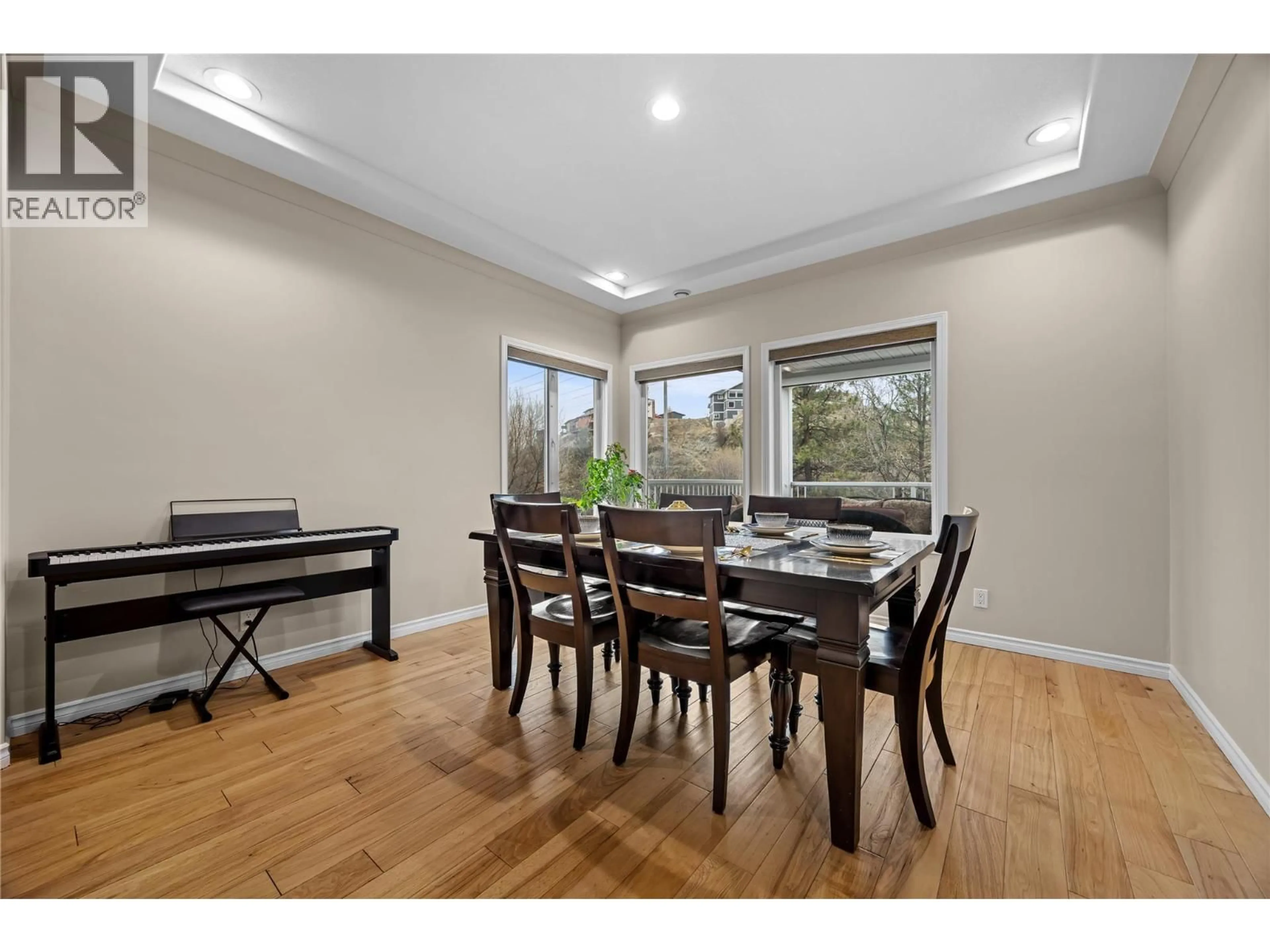 Dining room, wood/laminate floor for 240 HERITAGE BOULEVARD, Okanagan Falls British Columbia V0H1R3