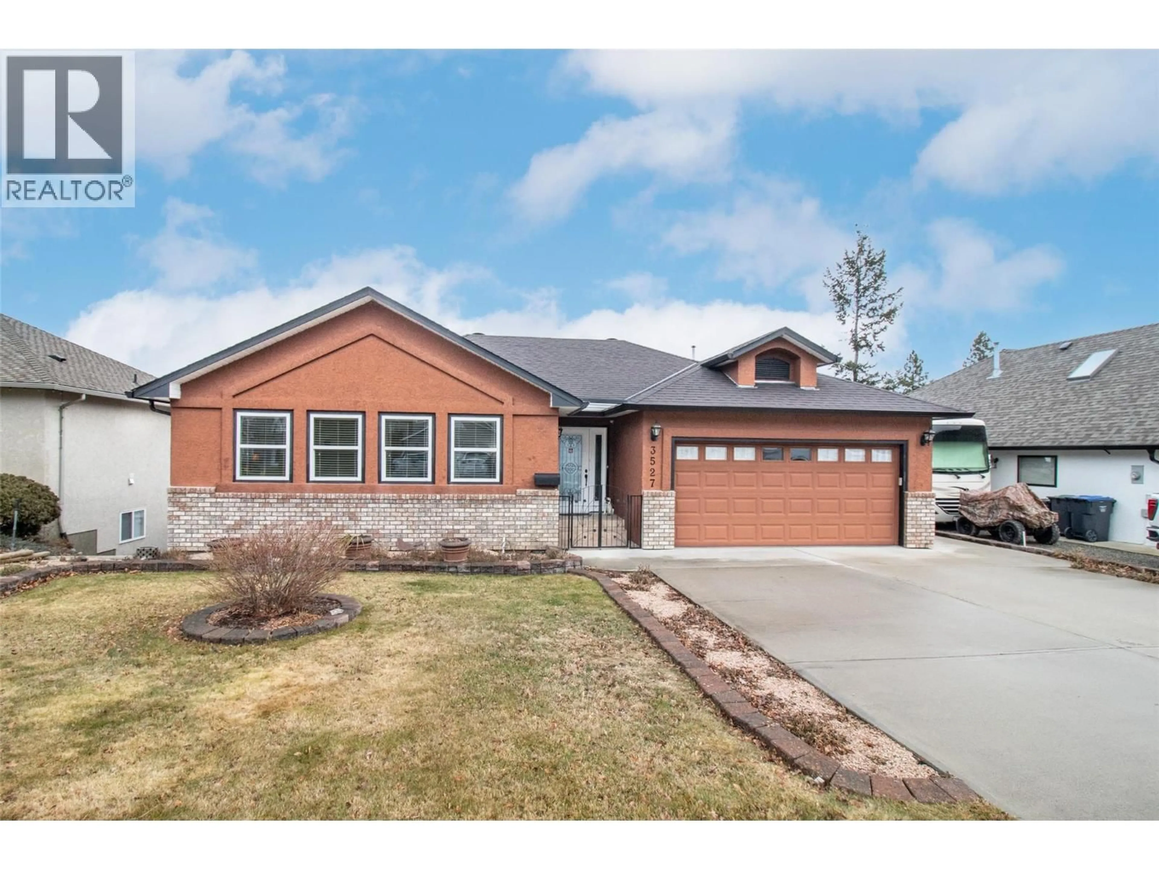 Home with brick exterior material, street for 3527 GLEN EAGLES DRIVE, West Kelowna British Columbia V4T2L6