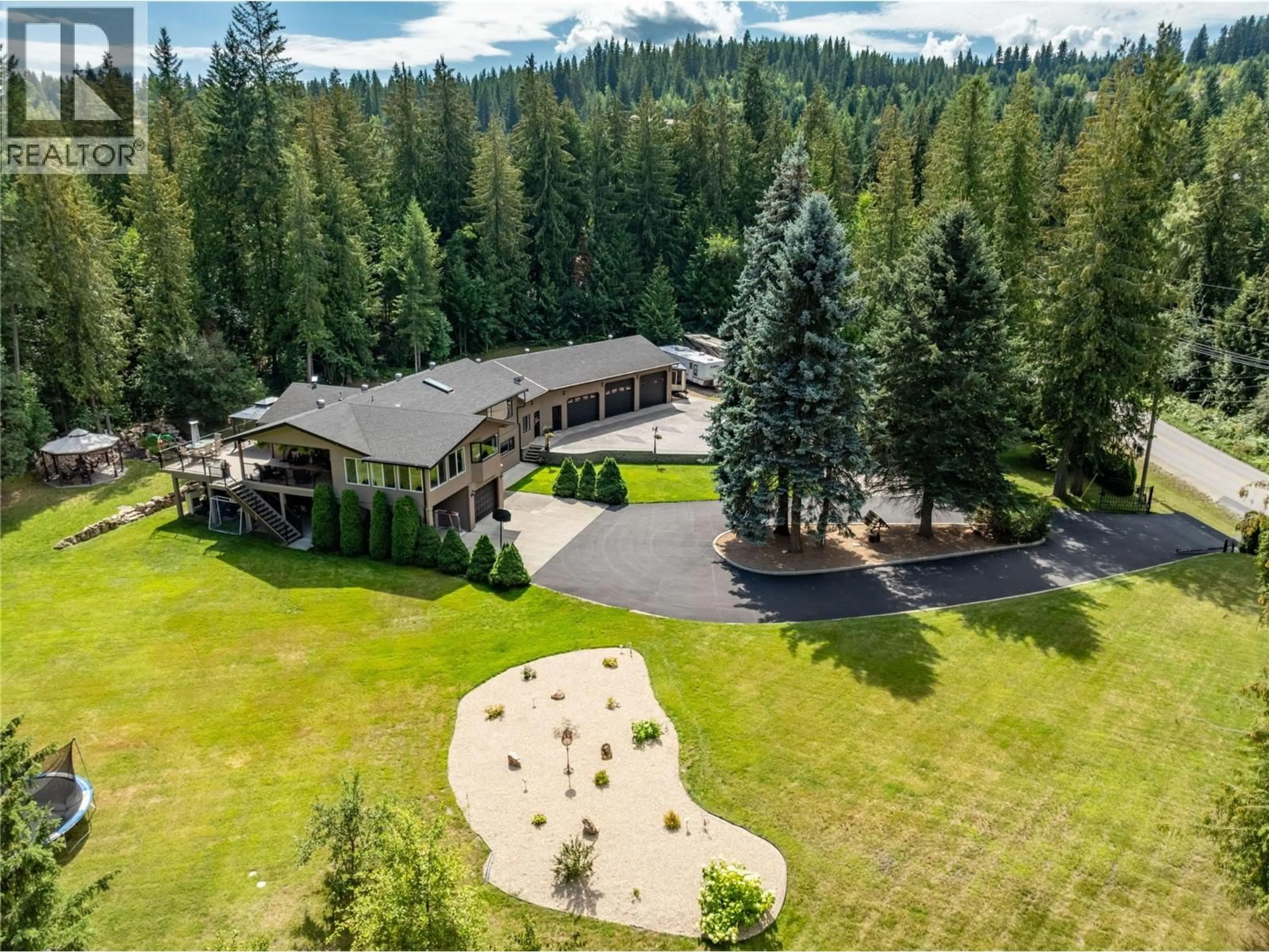 A pic from outside/outdoor area/front of a property/back of a property/a pic from drone, forest/trees view for 2746 BALMORAL ROAD, Blind Bay British Columbia V0E1H1